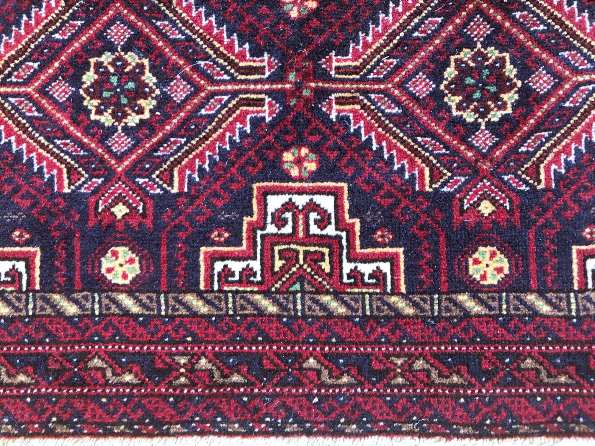 Mid-20th Century Persian Hand Knotted Red Black All-Over Baluchi Rug, circa 1960