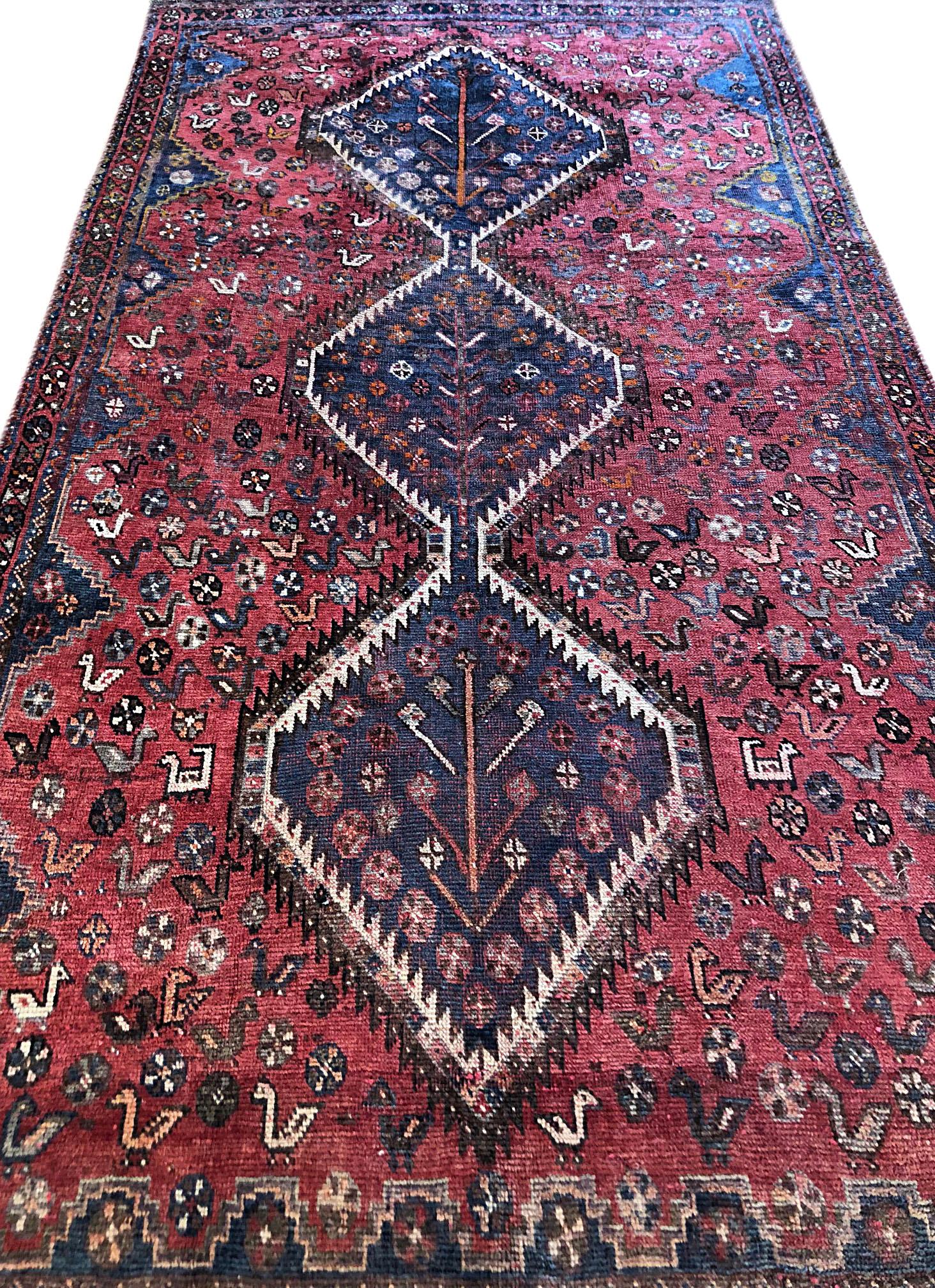 Tribal Persian Hand-Knotted Repeated Medallion Red Shiraz Bird Motif Rug