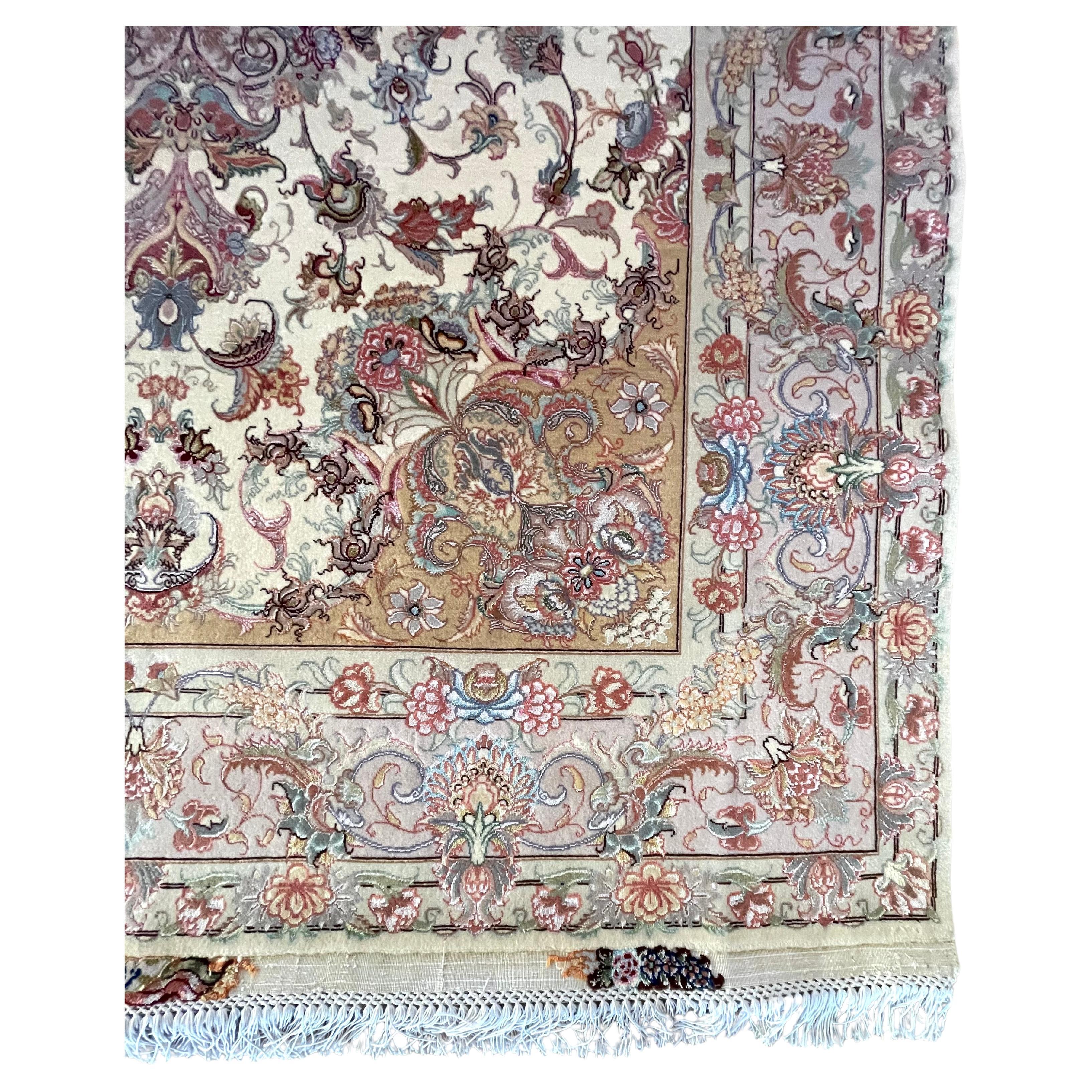 Introducing a stunning hand knotted Persian Tabriz rug that epitomizes quality craftsmanship and timeless beauty. Featuring an enchanting medallion floral design signed by Zamani, this rug captivates with its unique blend of colors and patterns and