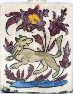 Jarrón persa de barro pintado a mano con un león y un antílope