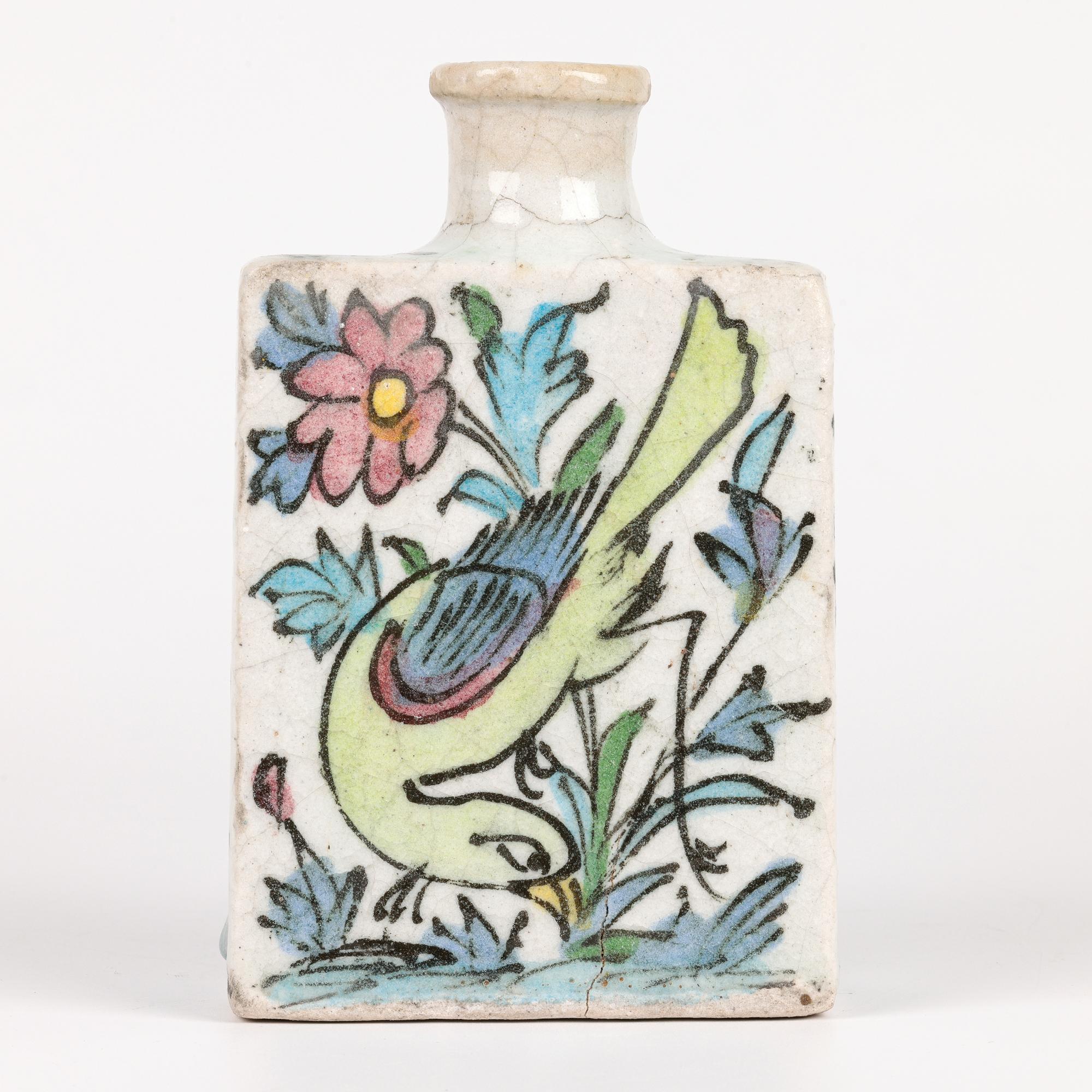 From a small collection of five Persian hand painted pottery vases is this stylish pair of earthenware rectangular shaped vases hand painted with birds and fish amidst flowering stems and dating from the early to mid-20th century. The rectangular