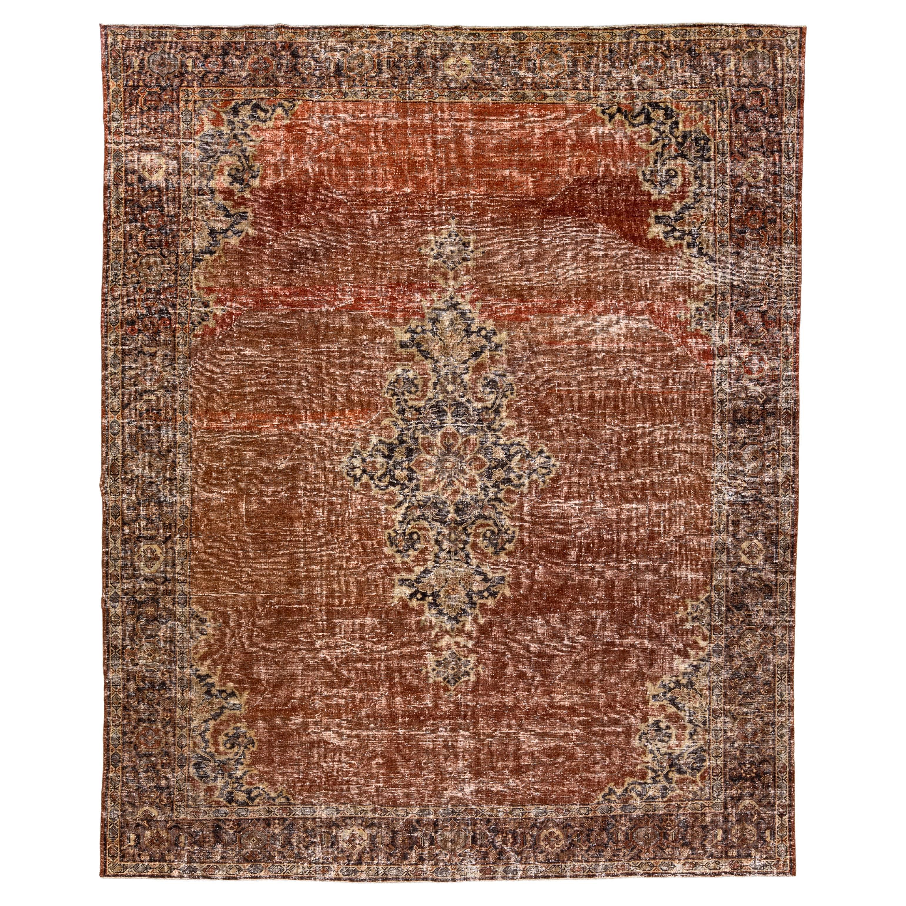 Persian Handmade Antique Tabriz Medallion Wool Rug With Copper Color Field For Sale