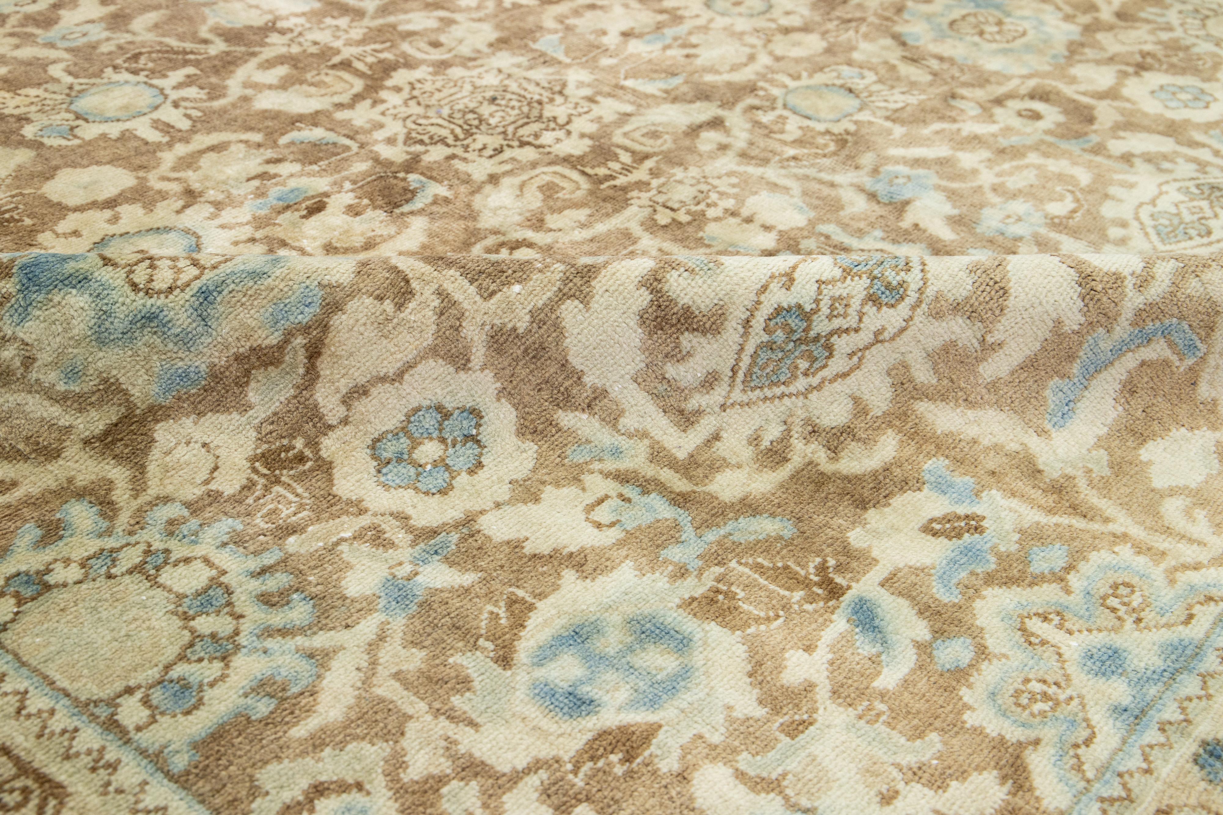 Hand-Knotted Persian Heriz Antique Wool Rug In Brown with Floral Design For Sale