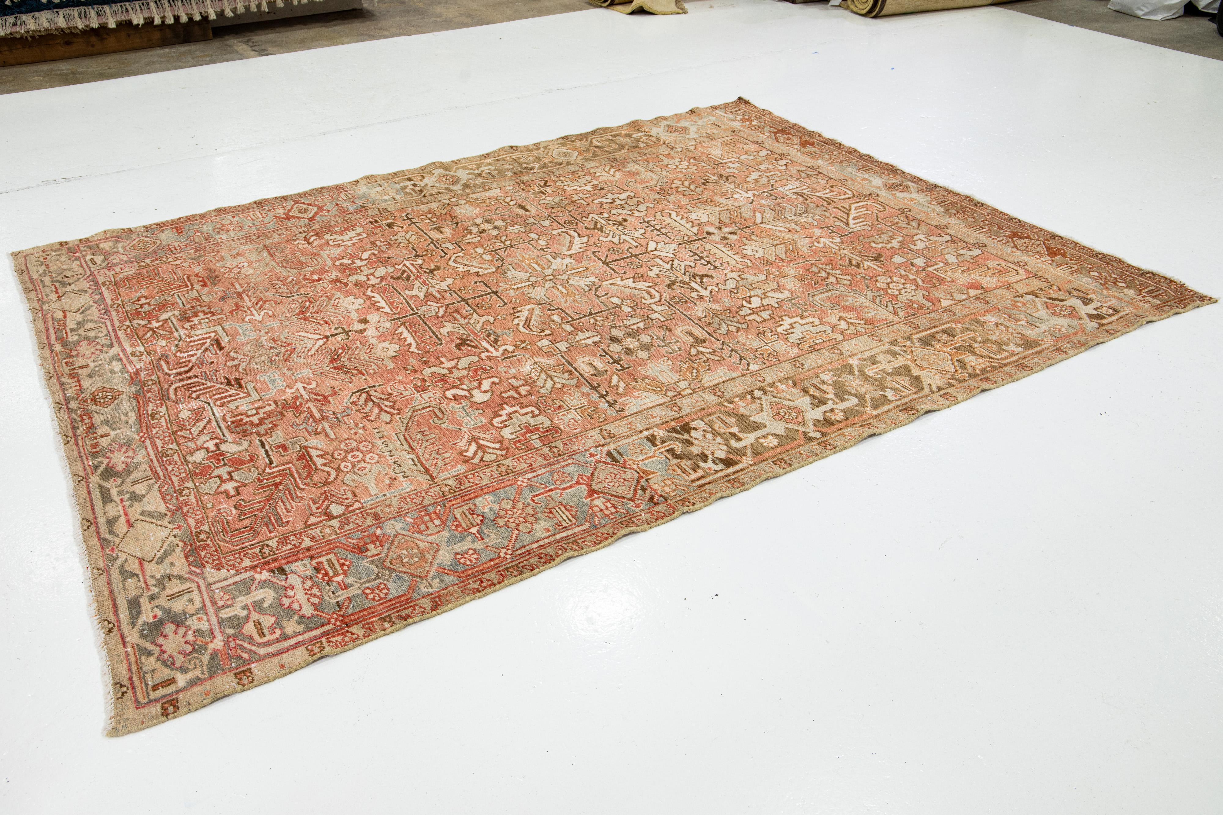 Persian Heriz Antique Wool Rug In Peach Featuring a Allover Motif  In Excellent Condition For Sale In Norwalk, CT