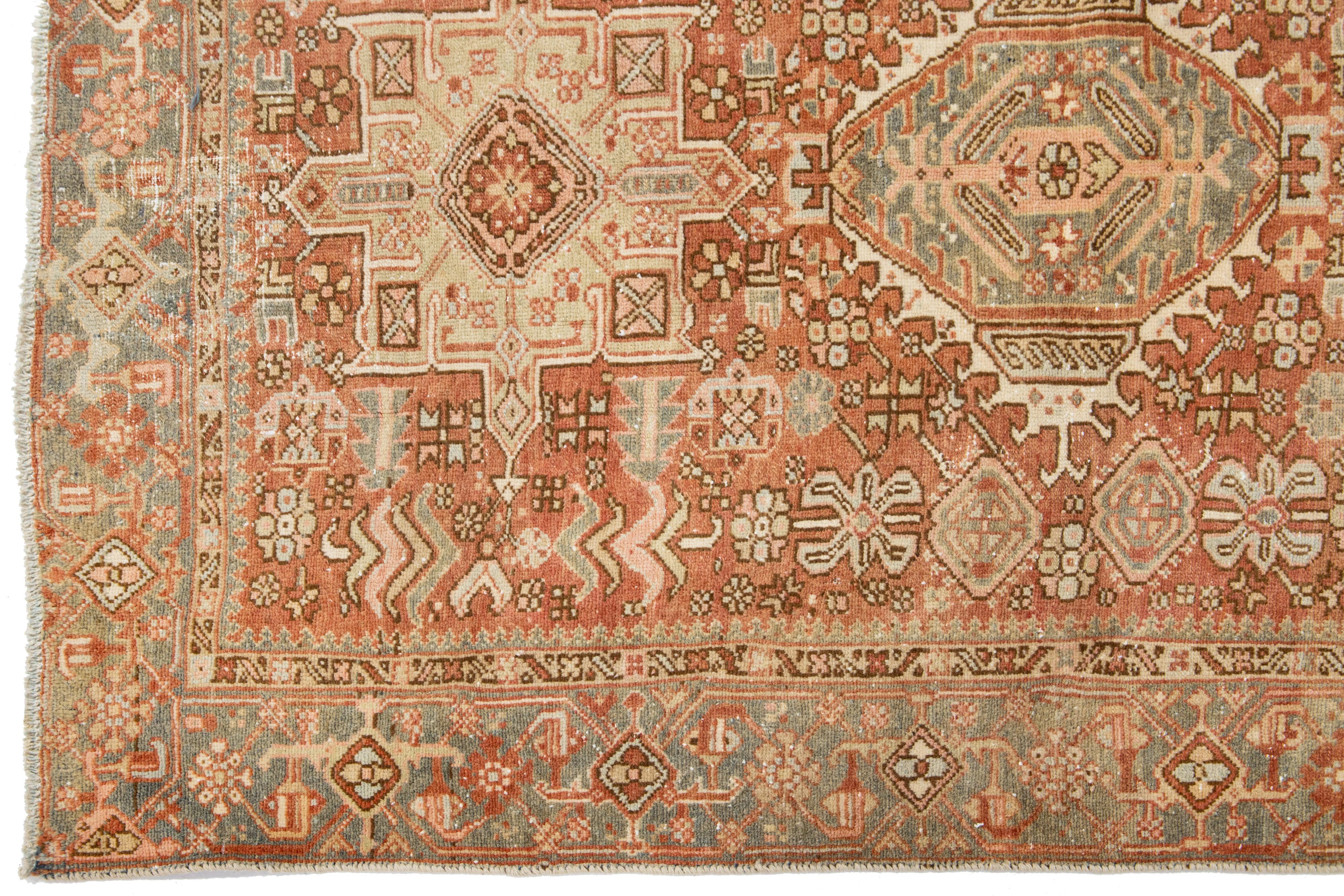 Persian Heriz Antique Wool Rug In Rust Color Featuring a Tribal Pattern In Good Condition For Sale In Norwalk, CT