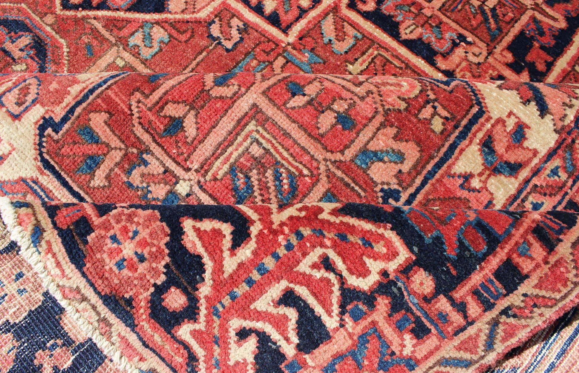 Persian Heriz Rug with Stylized Geometric Medallion in Rust Red, Ivory and Blue In Excellent Condition In Atlanta, GA