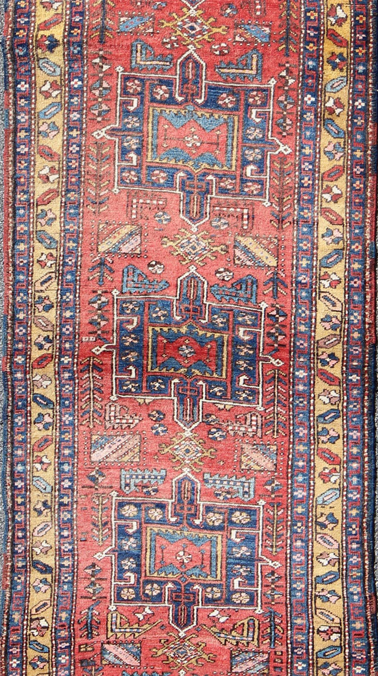 Hand-Knotted Persian Heriz Semi Antique Runner in Soft Red, Blue and Yellow Colors