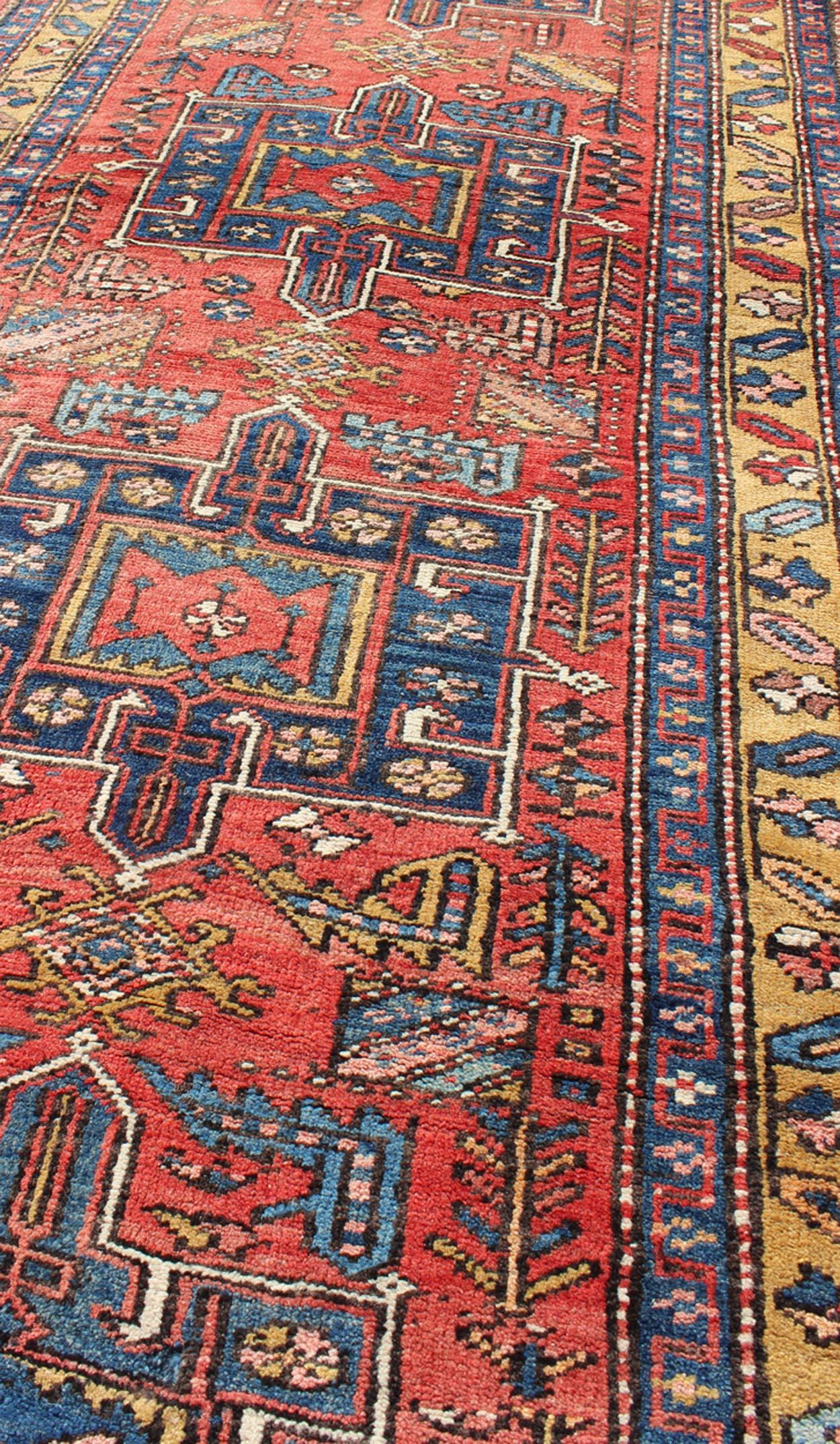 20th Century Persian Heriz Semi Antique Runner in Soft Red, Blue and Yellow Colors