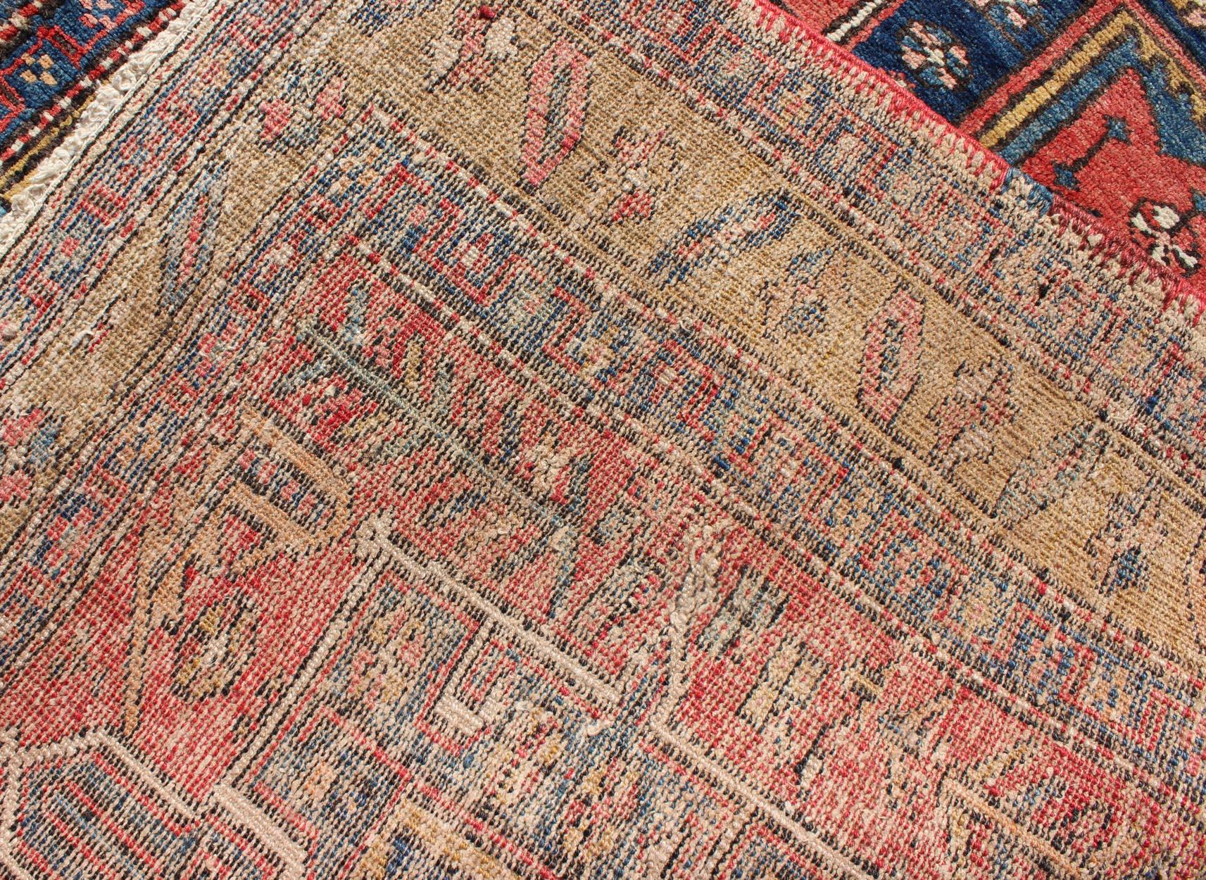 Wool Persian Heriz Semi Antique Runner in Soft Red, Blue and Yellow Colors