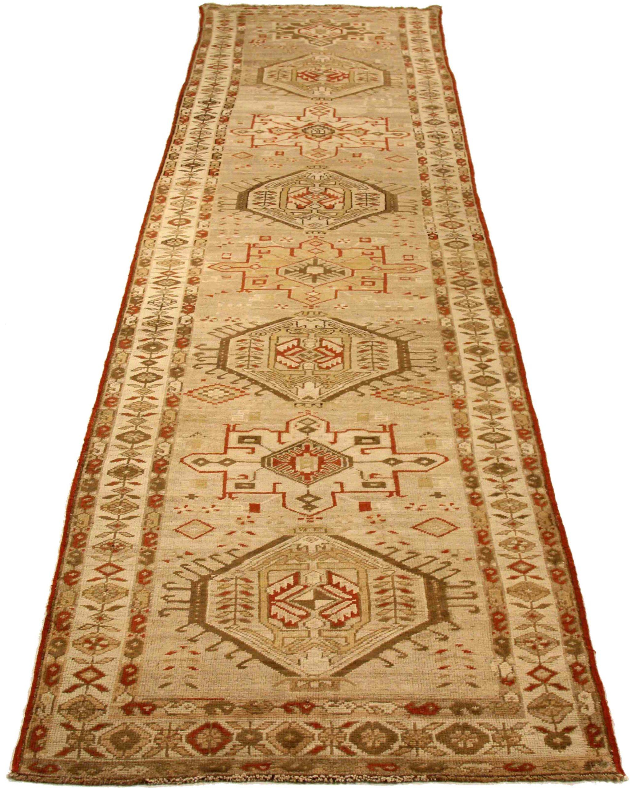 Discover the elegance of Persian Heriz featuring Runner Rug in Circa 1910. Designed with Wool and BrownIvoryRed, this exclusive design is perfect for enhancing your space.