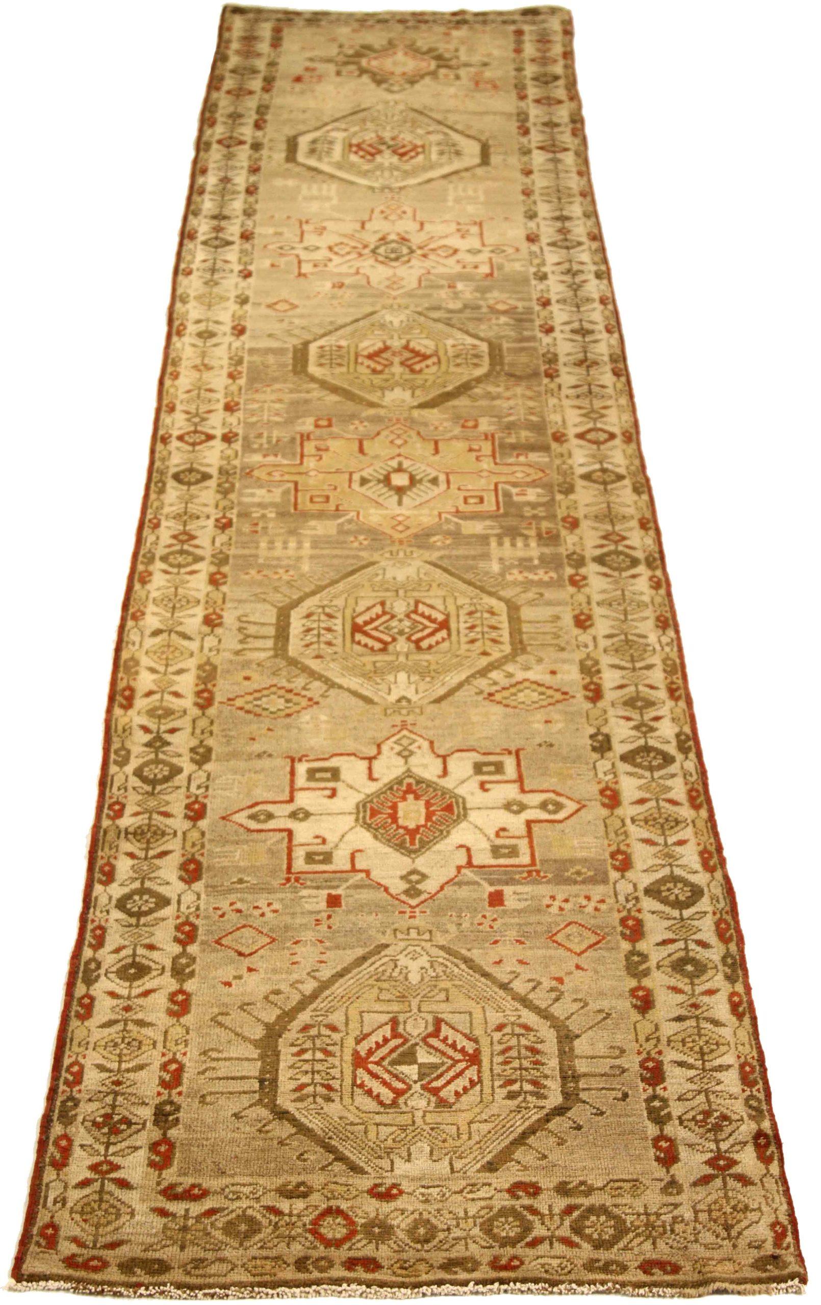 Discover the elegance of Persian Heriz featuring Runner Rug in Circa 1910. Designed with Wool and BrownIvoryRed, this exclusive design is perfect for enhancing your space.