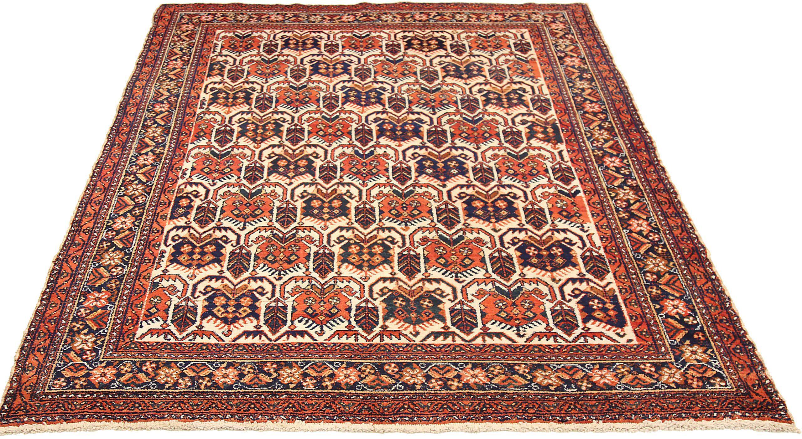 Entdecken Sie die Eleganz des persischen Isfahan mit dem kleinen Teppich von CIRCA 1910. Dieses exklusive Design aus Wolle und ElfenbeinMarineblauRot ist perfekt, um Ihren Raum zu verschönern.
