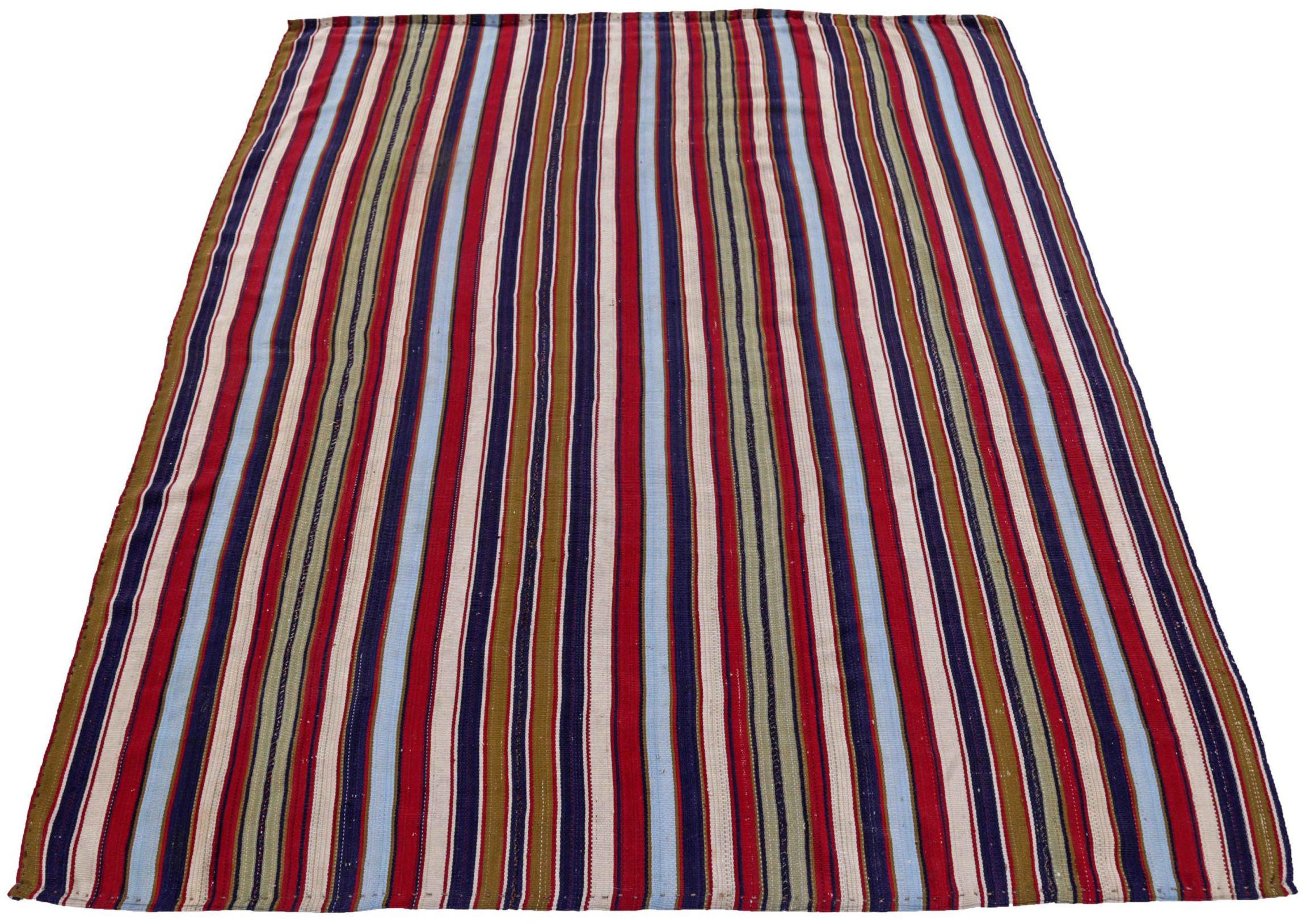 Entdecken Sie die Eleganz des persischen Jajim mit dem kleinen Teppich von CIRCA 1910. Dieses exklusive Design aus Wolle und BlauGrünElfenbeinRot eignet sich perfekt, um Ihren Raum zu verschönern.