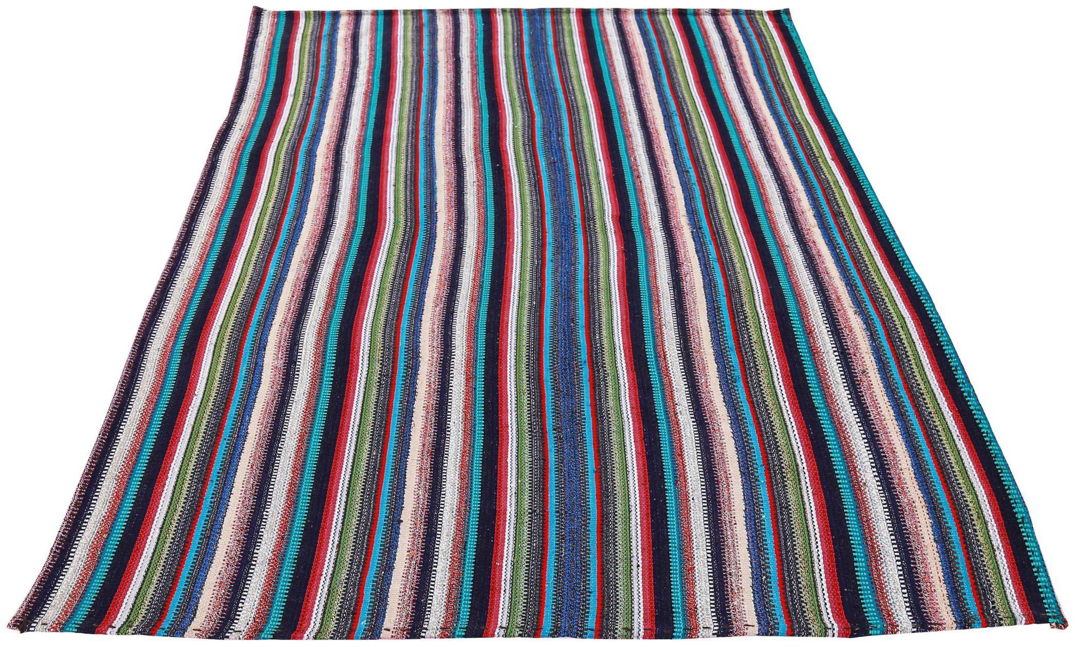 Entdecken Sie die Eleganz des persischen Jajim mit dem kleinen Teppich von CIRCA 1910. Dieses exklusive Design aus Wolle und BlauGrünElfenbeinRot eignet sich perfekt, um Ihren Raum zu verschönern.
