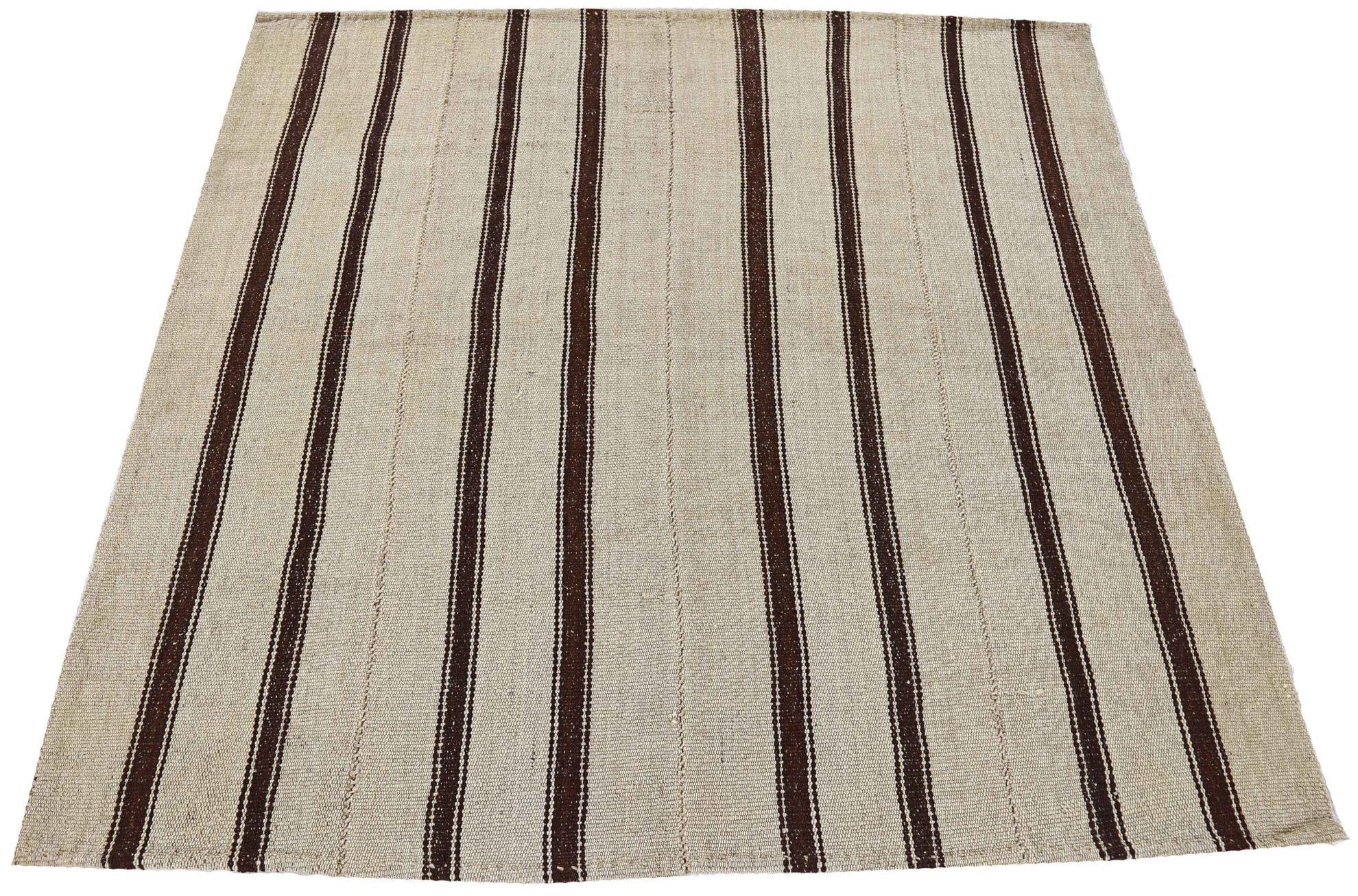 Discover the elegance of Persian Jajim featuring Square Area Rugs in Circa 1910. Designed with Wool and BrownIvory, this exclusive design is perfect for enhancing your space.