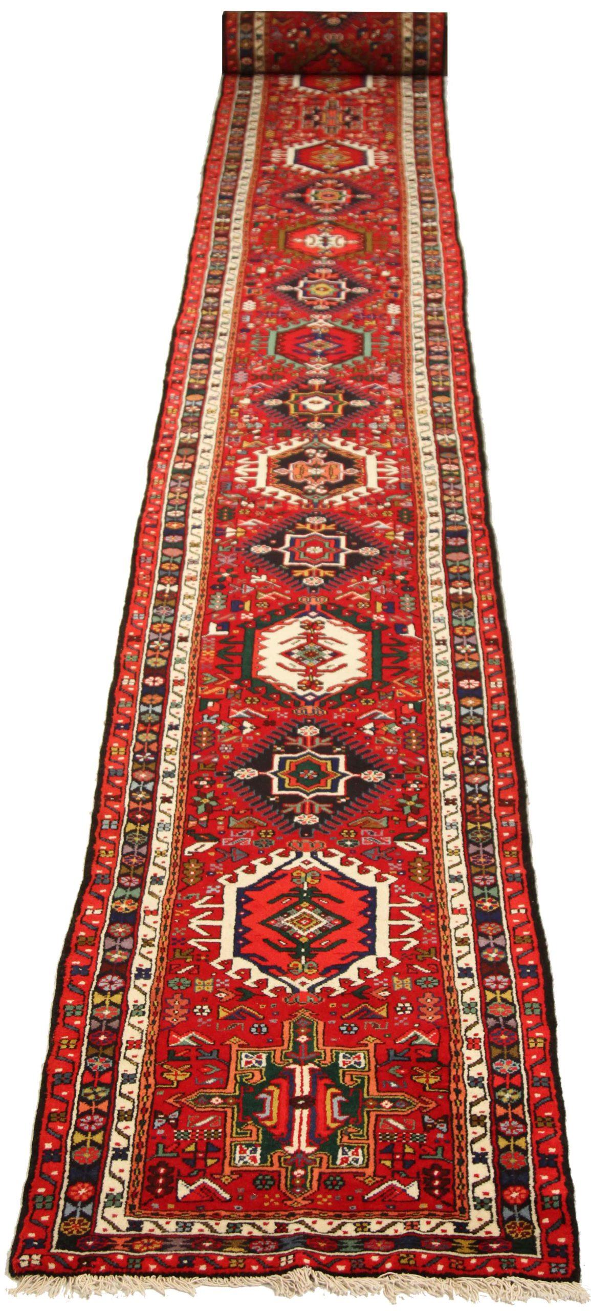 Discover the elegance of Persian Karajeh featuring Runner Rug in Circa 1910. Designed with Wool and BlackIvoryRed, this exclusive design is perfect for enhancing your space.