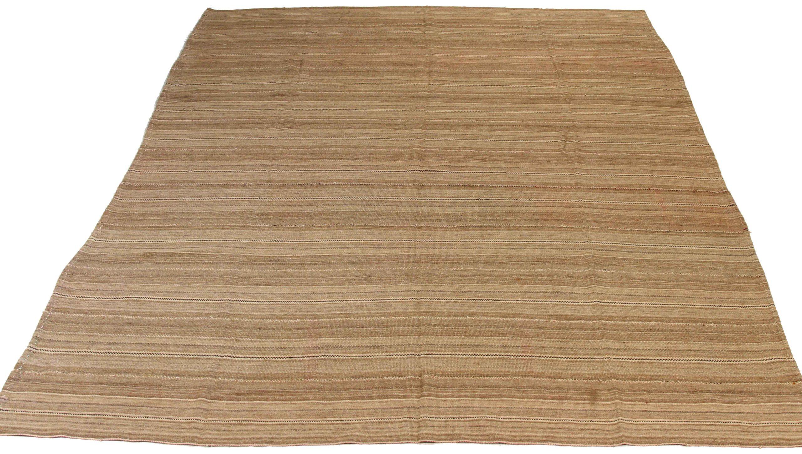 Discover the elegance of Persian Kilim featuring Area Rugs in Circa 1910. Designed with Wool and BrownIvoryTaupe, this exclusive design is perfect for enhancing your space.
