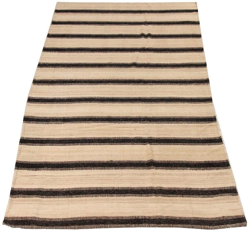 Discover the elegance of Persian Kilim featuring Area Rugs in Circa 1990. Designed with meticulous attention to detail, this exclusive design is perfect for enhancing your space.