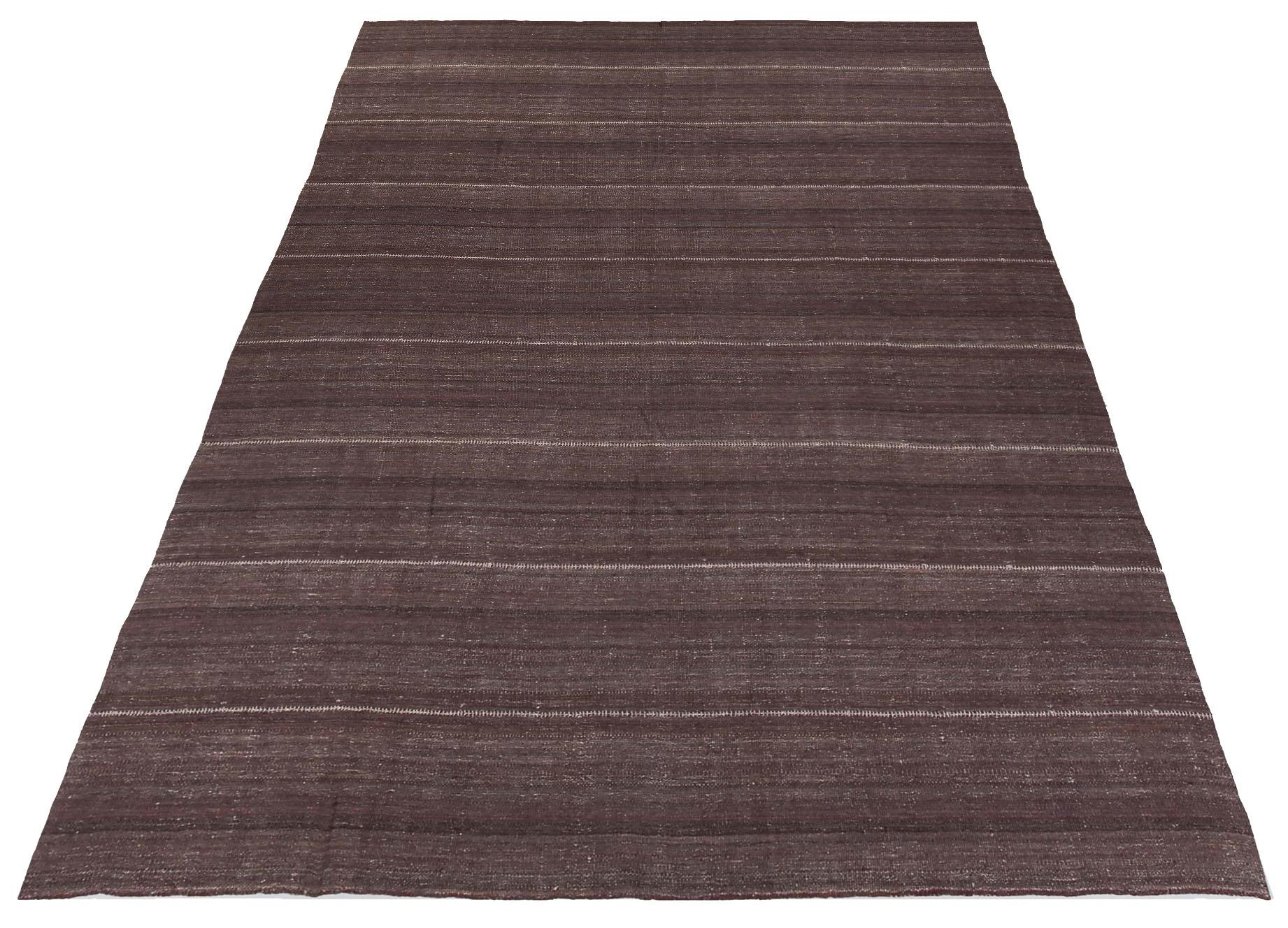 Discover the elegance of Persian Kilim featuring Area Rugs in Circa 1990. Designed with Wool and BrownIvory, this exclusive design is perfect for enhancing your space.