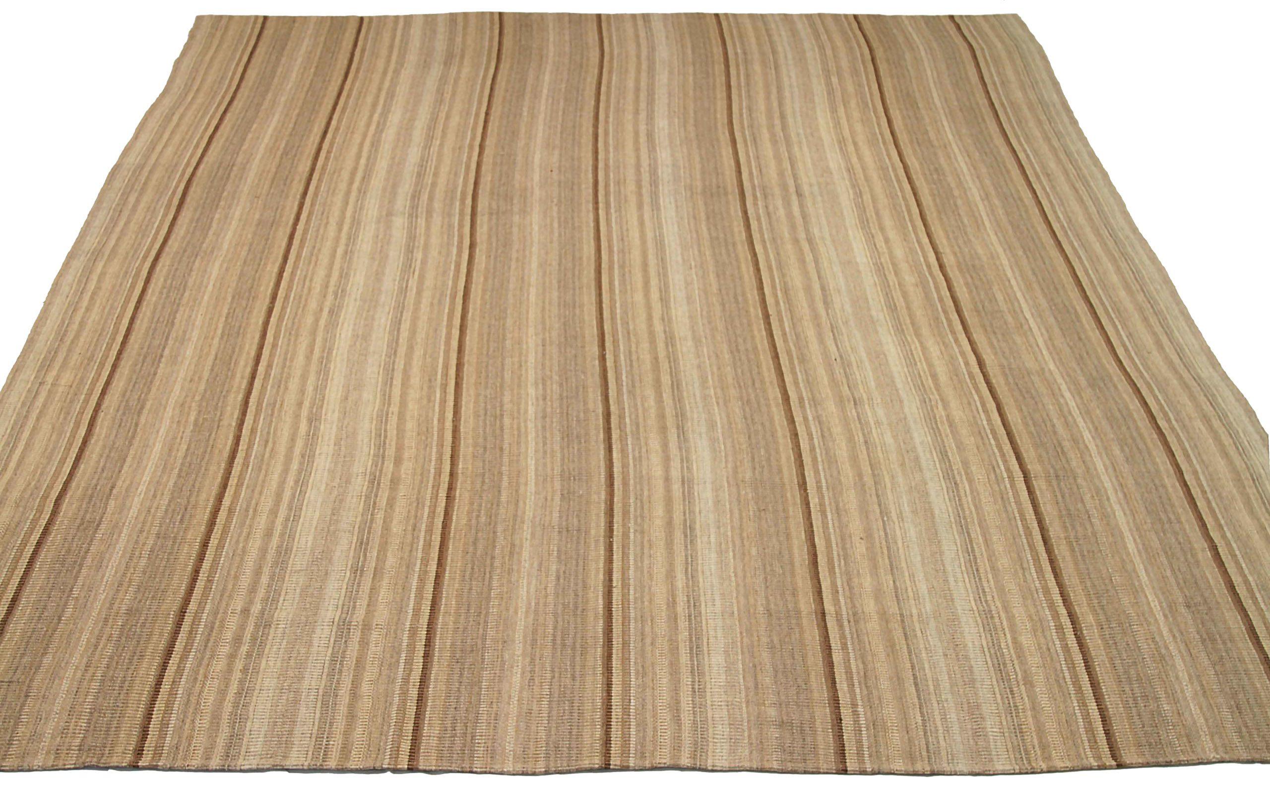 Discover the elegance of Persian Kilim featuring Area Rugs in Circa 1910. Designed with Wool and BrownIvoryTaupe, this exclusive design is perfect for enhancing your space.