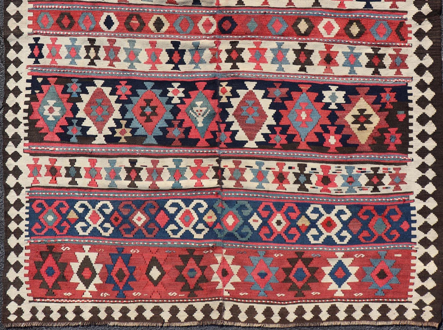 Persian Kilim Rug with Bold Tribal Geometric Patterns in Vivid Colors 4'9 x 6'9 For Sale 4