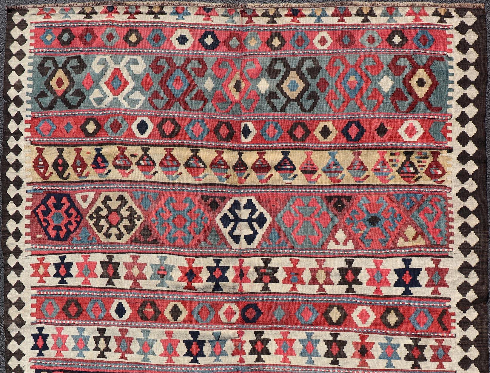 Persian Kilim Rug with Bold Tribal Geometric Patterns in Vivid Colors 4'9 x 6'9 For Sale 2