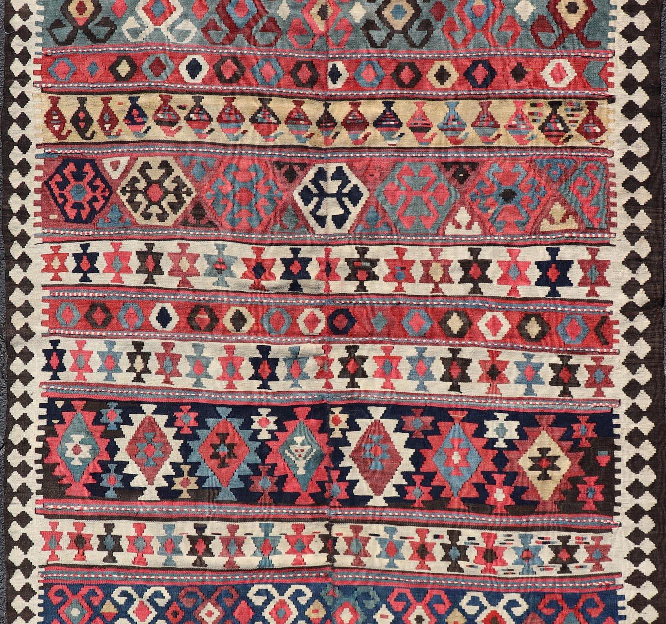 Persian Kilim Rug with Bold Tribal Geometric Patterns in Vivid Colors 4'9 x 6'9 For Sale 3