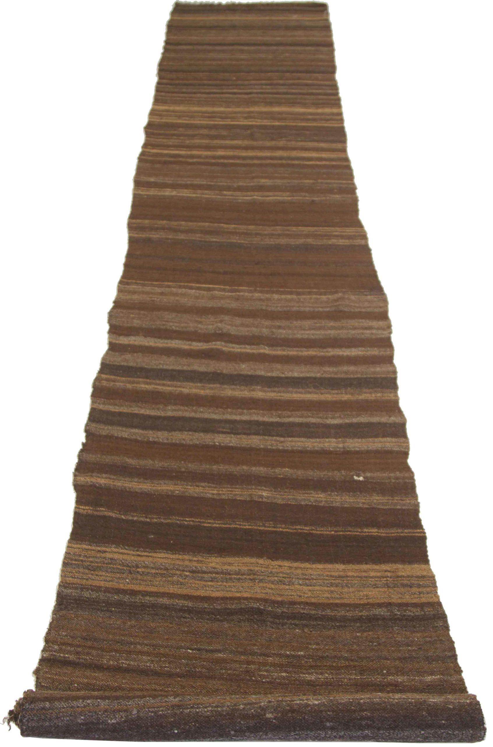 Discover the elegance of Persian Kilim featuring Runner Rug in Circa 1910. Designed with Wool and BrownYellow, this exclusive design is perfect for enhancing your space.