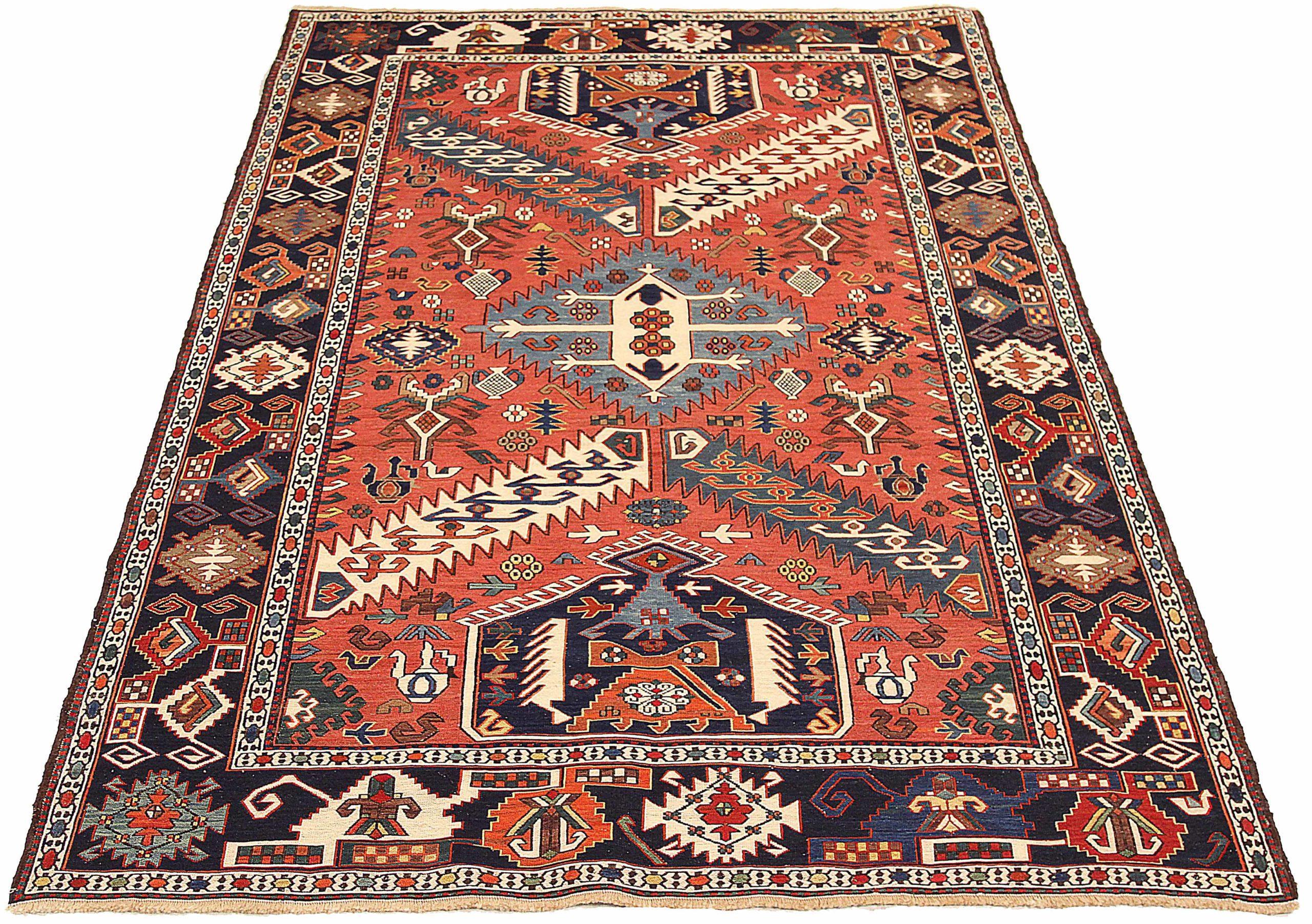 Entdecken Sie die Eleganz eines persischen Kilims mit einem kleinen Teppich von CIRCA 1880. Dieses exklusive Design aus Wolle und BlauGrünElfenbeinRot eignet sich perfekt, um Ihren Raum zu verschönern.