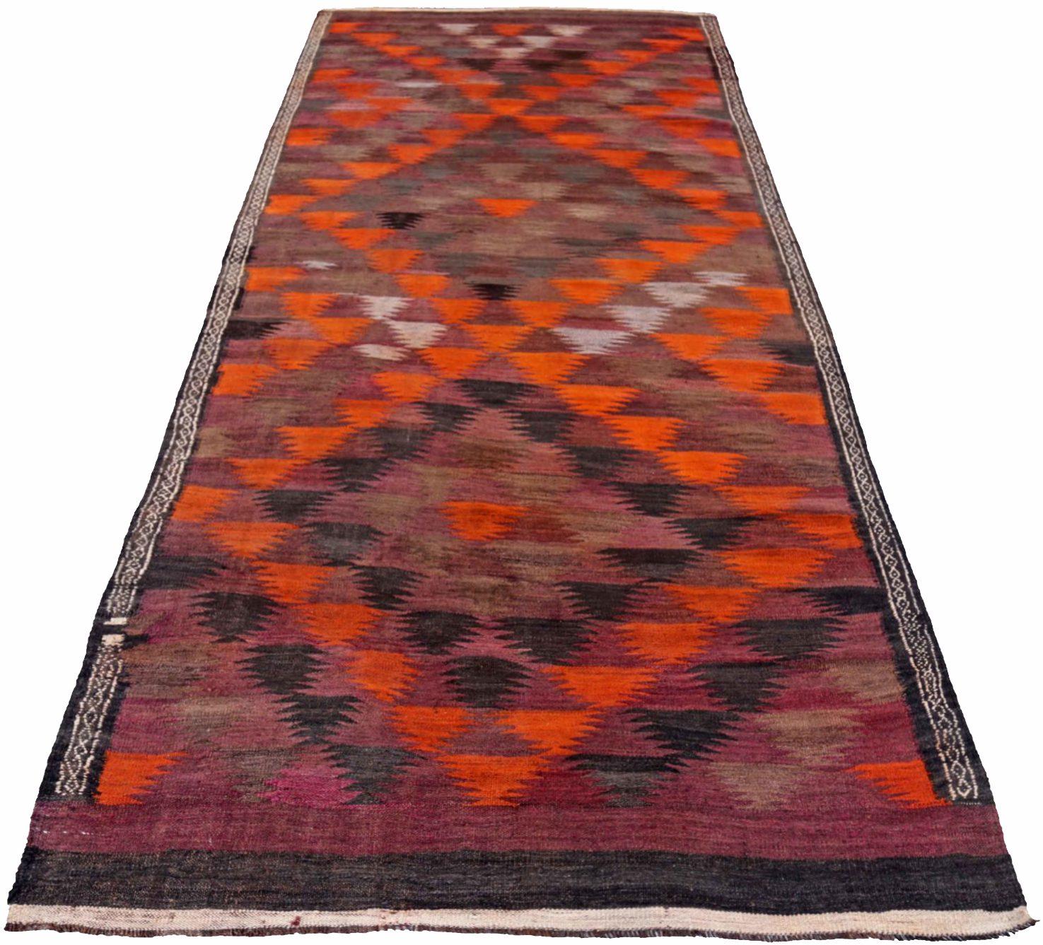 Discover the elegance of Persian Kilim featuring Small Rug in Circa 1910. Designed with Wool and BrownOrangePurpel, this exclusive design is perfect for enhancing your space.