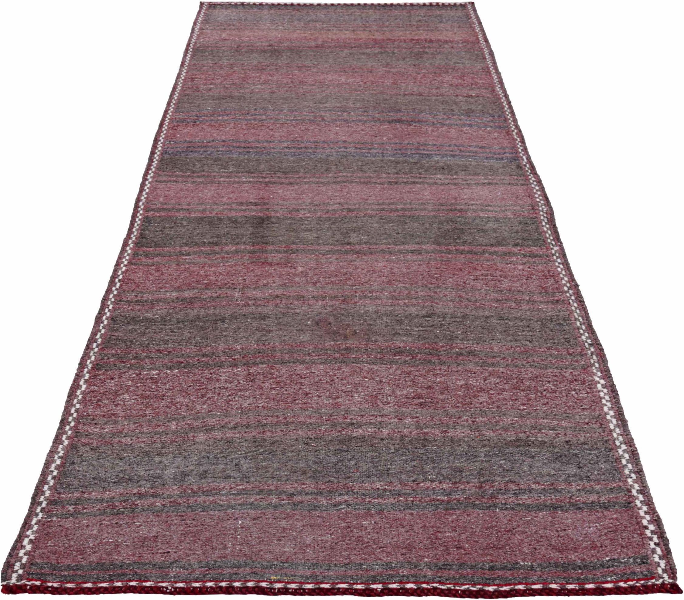 Discover the elegance of Persian Kilim featuring Small Rug in Circa 1910. Designed with Wool and BrownPink, this exclusive design is perfect for enhancing your space.