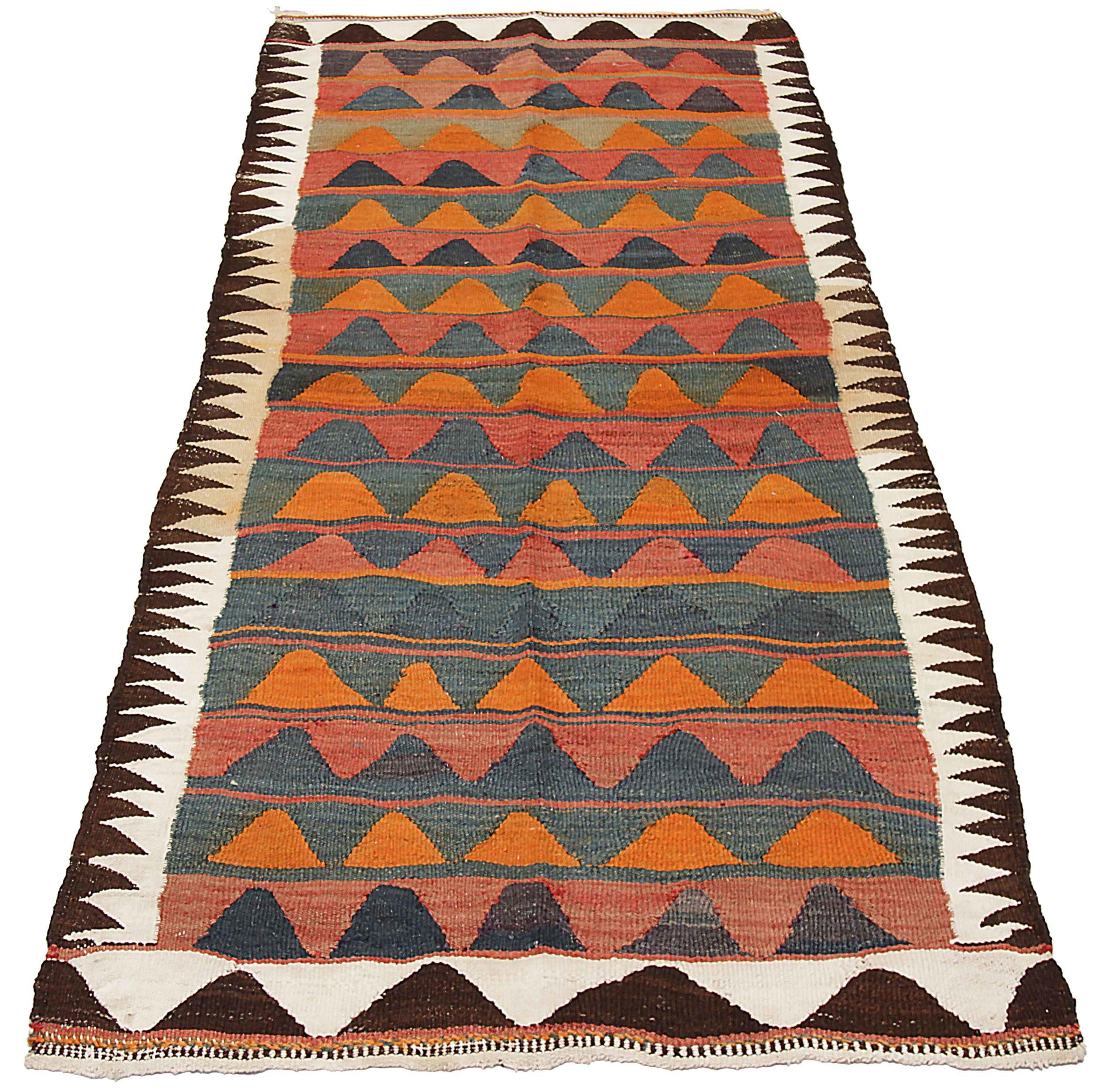 Discover the elegance of Persian Kilim featuring Small Rug in Circa 1910. Designed with Wool and BlueIvoryOrange, this exclusive design is perfect for enhancing your space.