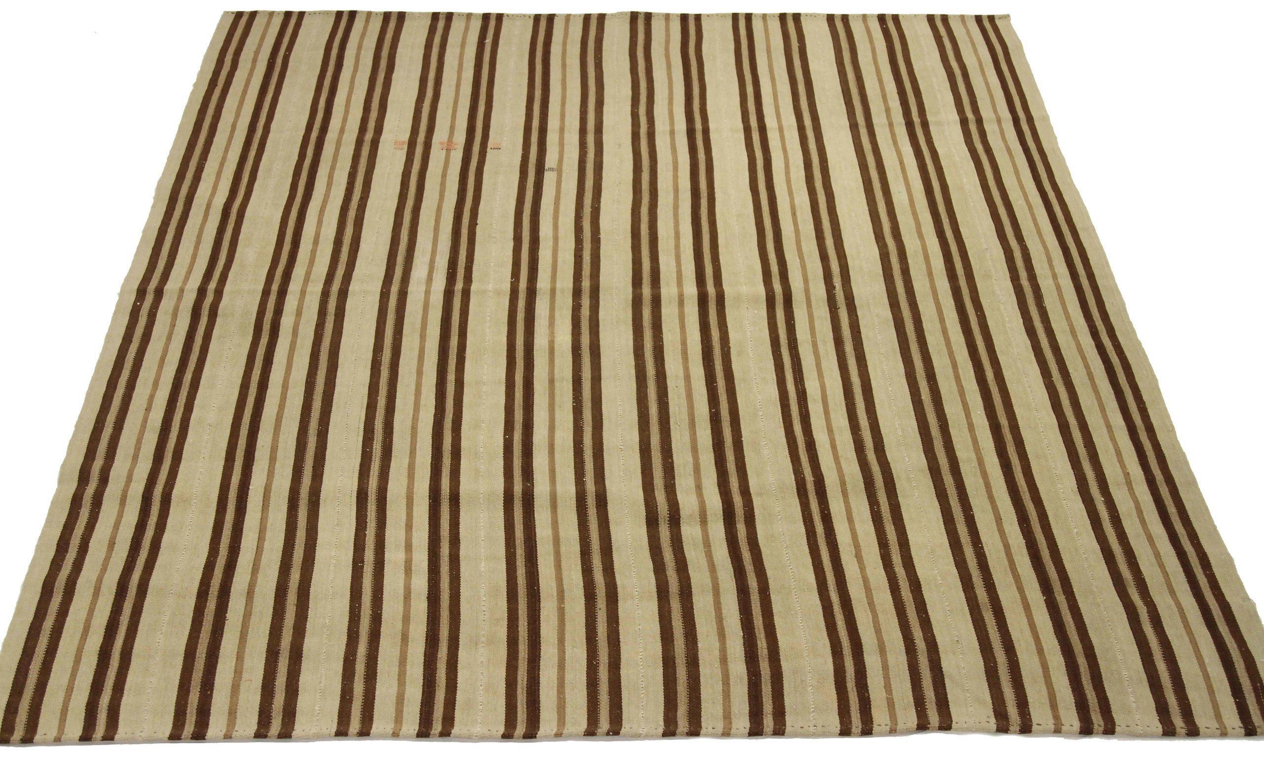 Discover the elegance of Persian Kilim featuring Small Rug in Circa 1910. Designed with Wool and BrownIvory, this exclusive design is perfect for enhancing your space.