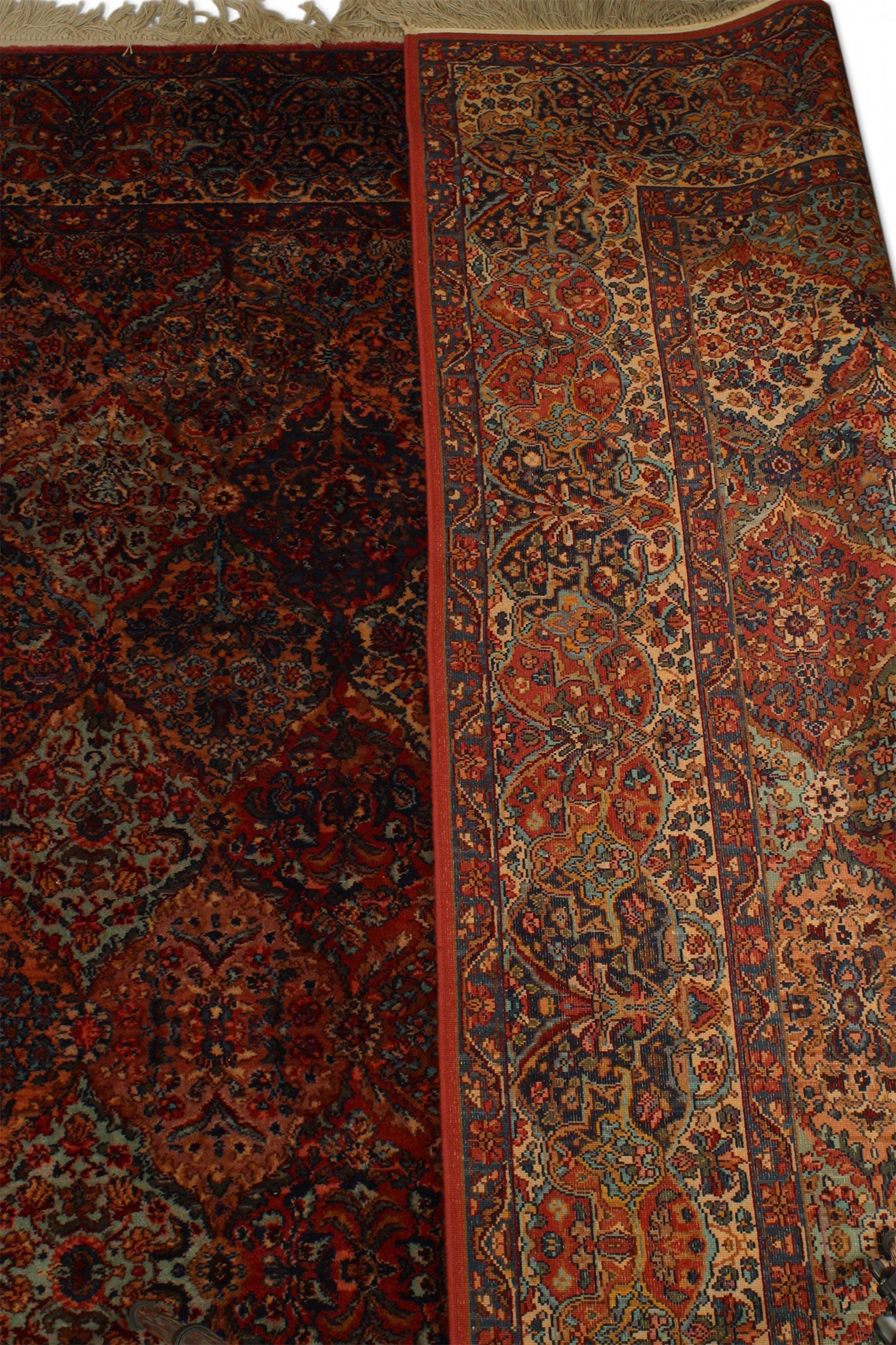 Persischer Kirman-Teppich aus roter und blauer Wolle (20. Jahrhundert) im Angebot
