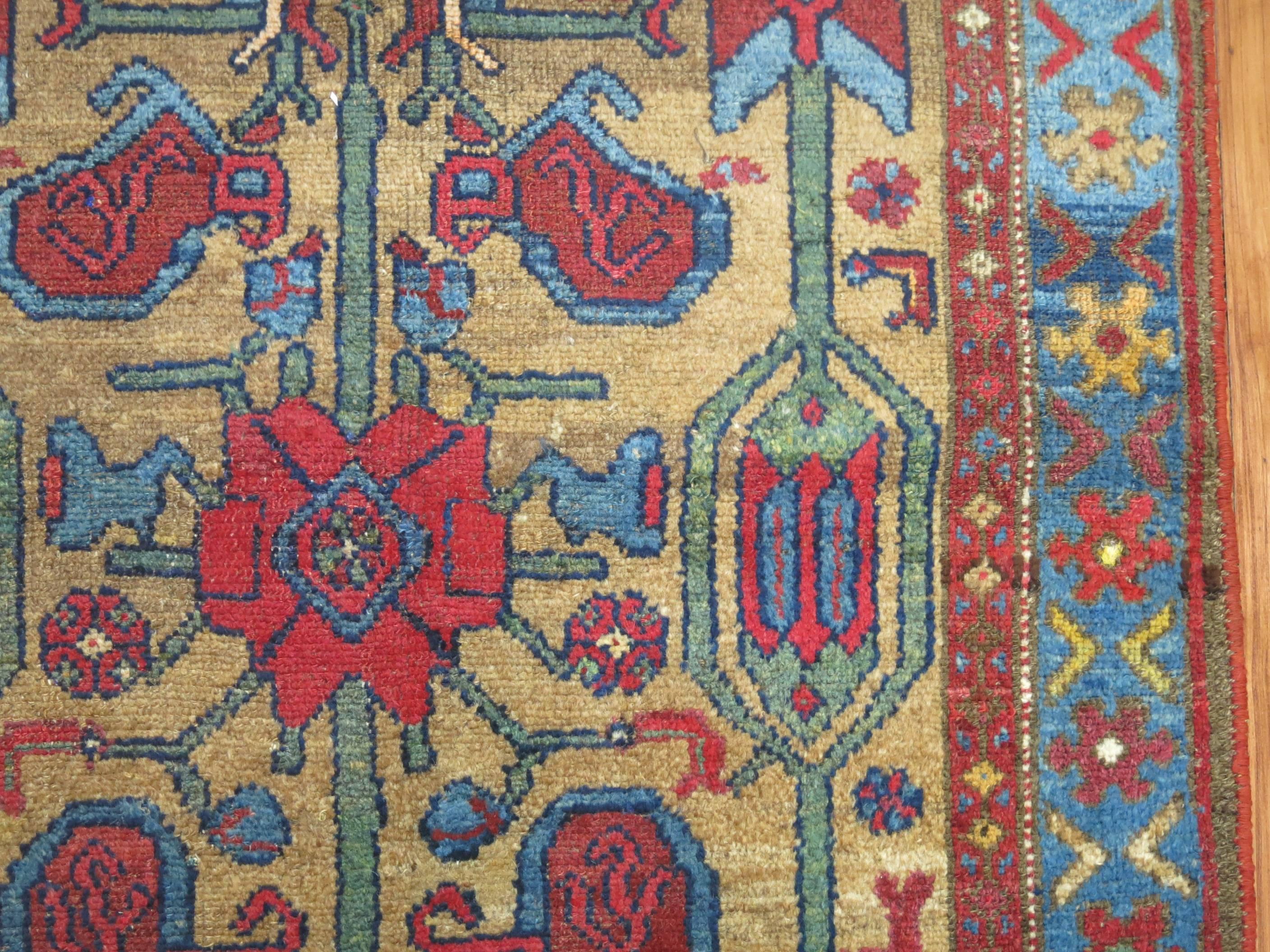 A colorful early 20th century Persian Kurd Serab rug.

3'8'' x 6'1''