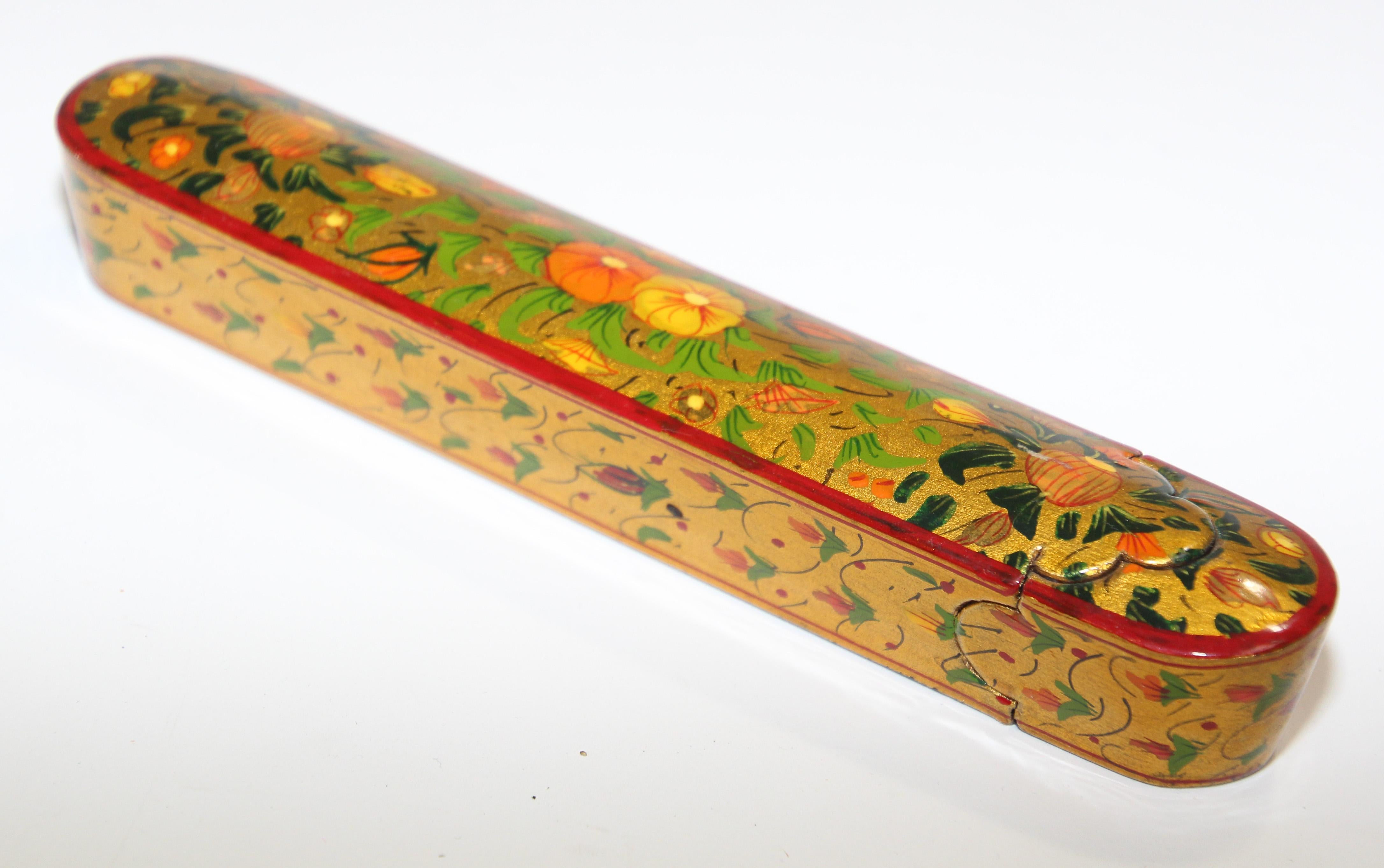 Persian hand painted lacquer pen box in rectangular shape.
Decorated with floral designs on gold background, black interior.
Moorish Mughal pen box papier maché with miniature floral painting in the Persian style.
Great Islamic Art collector
