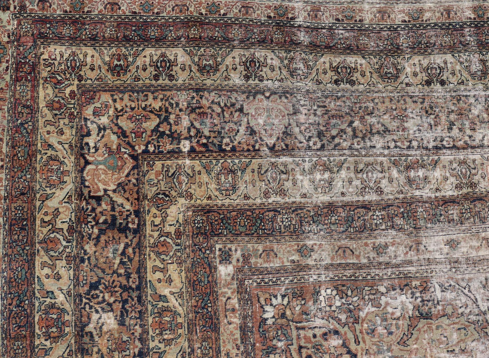 Measures: 10'5 x 16'1.
Persian Lavar Kerman Rug with Faded Camel Medallion and Ornamental Border Motifs. Keivan Woven Arts/ rug/ D-0929, country of origin / type: Iran / Lavar Kerman, circa 1880.

A truly distinguished piece, this Antique Persian