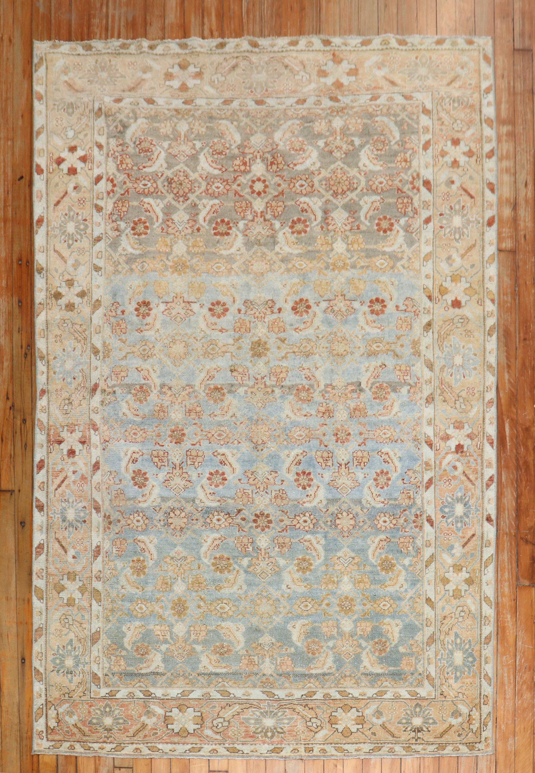 An accent size early 20th century Persian Malayer rug in light blues and peach tones

Measures: 4'6 x 6'15