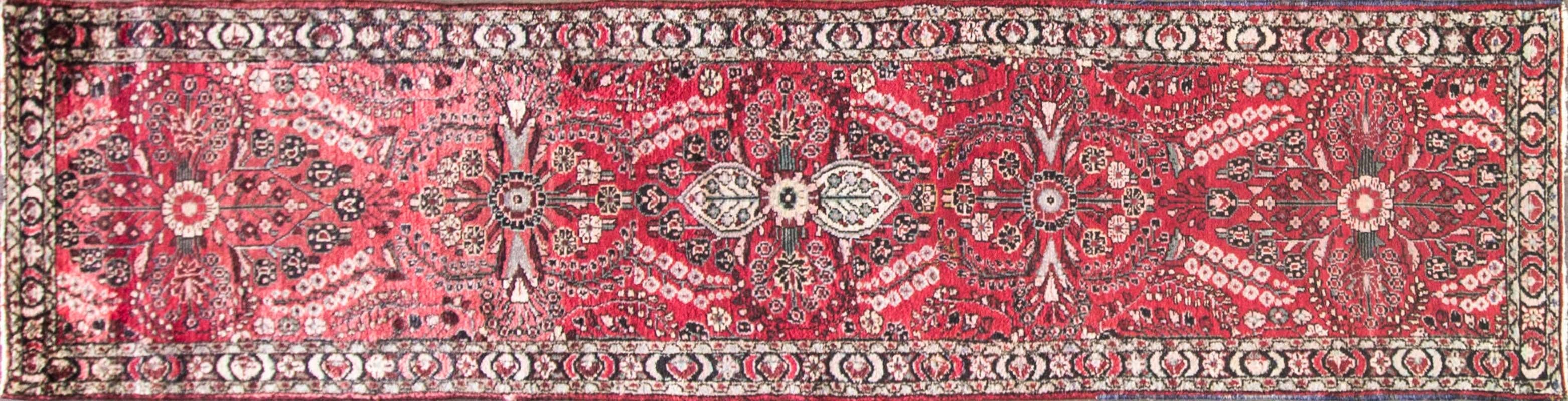 Vintage Persian Lilihan rug featuring an allover pattern on a red field. Measures: 2'7