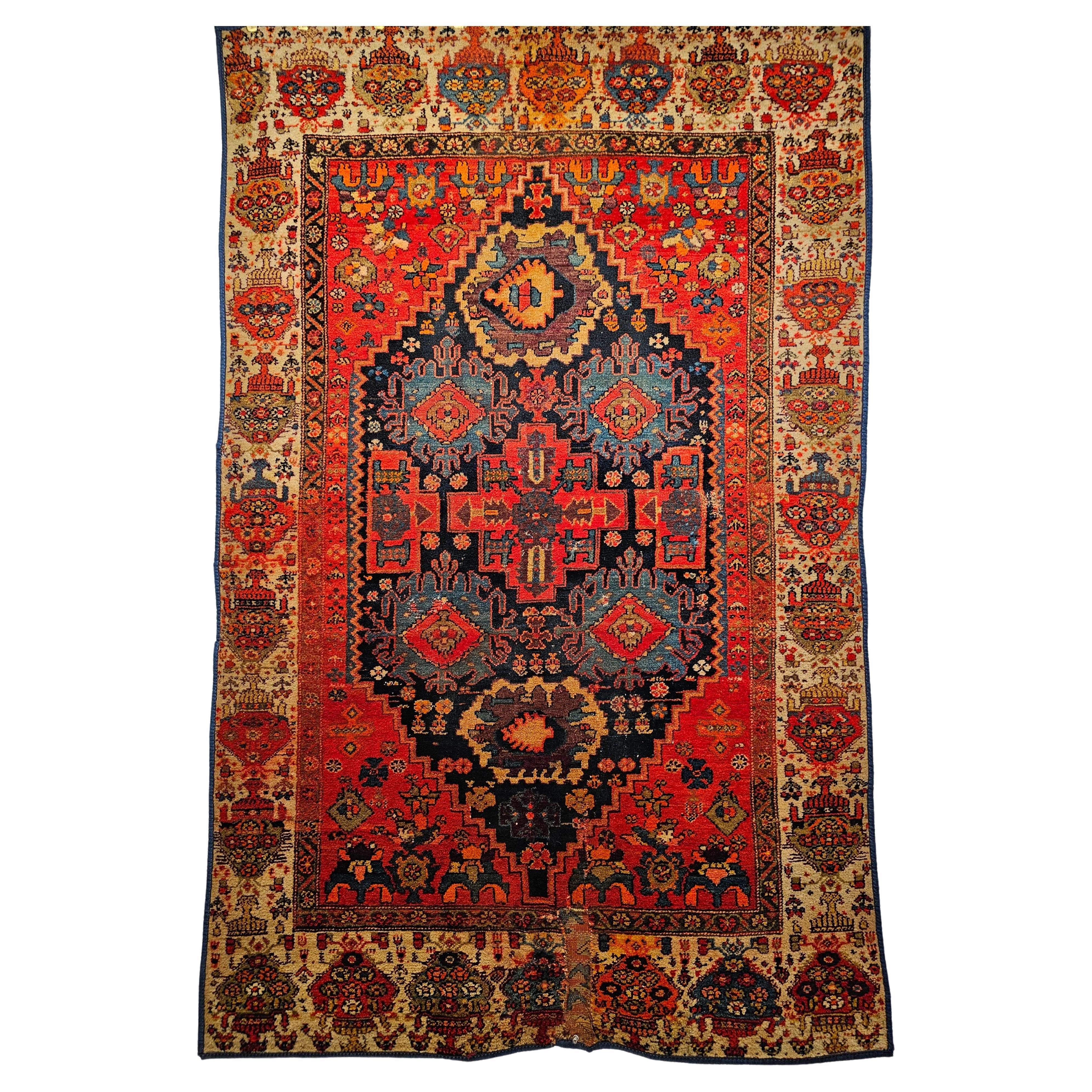Vintage Persian Malayer Area Rug in Allover Geometric Design in Red, Blue, Ivory from the early 1900s.  The Persian Malayer has an extremely desirable and sought after “allover geometric” design.  In addition, the color scheme for the geometric