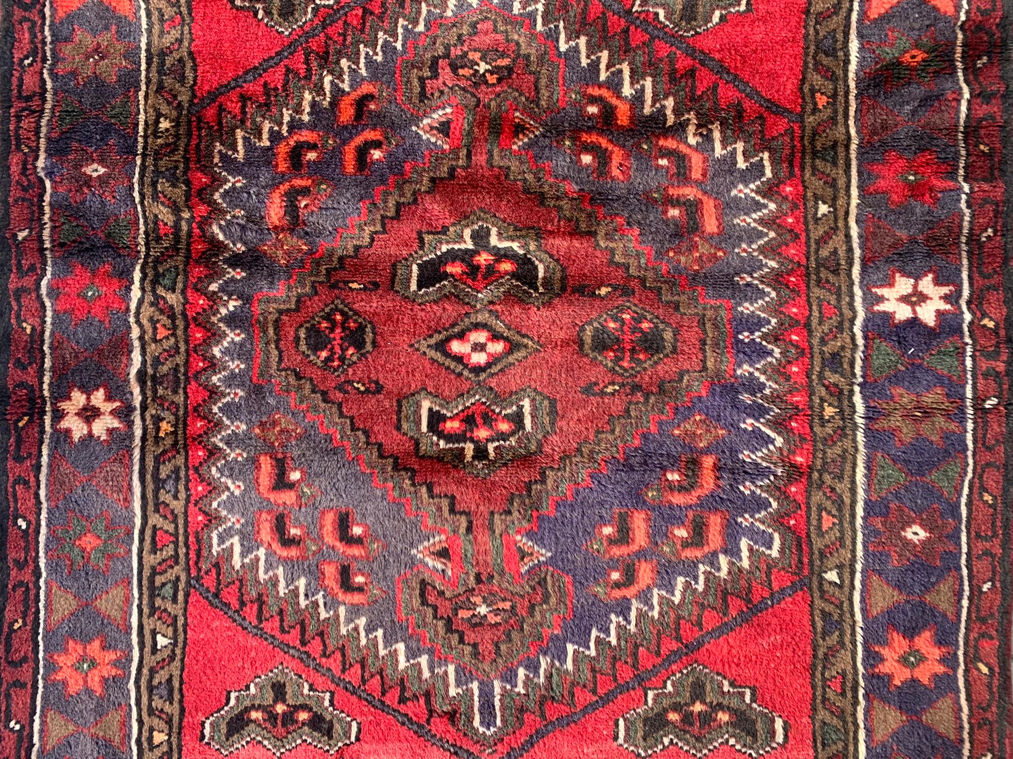 Hand-knotted wool pile on a cotton foundation.

Circa 1970

Dimensions: 3'2