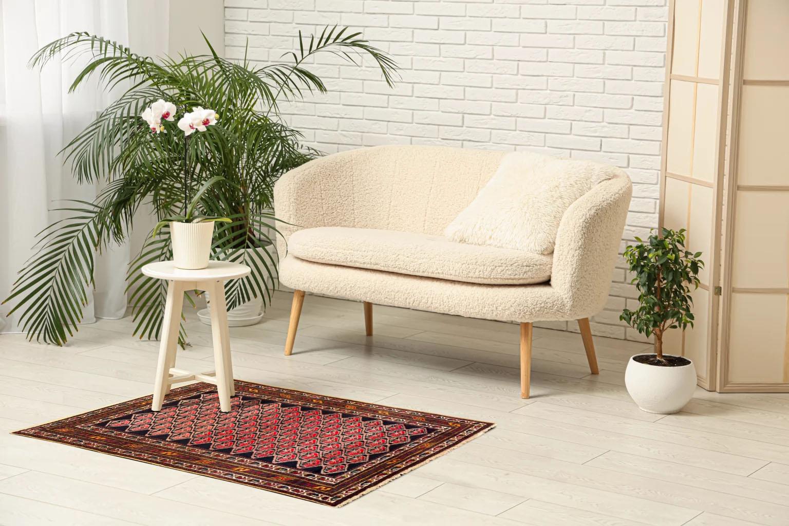 An Antique Persian Malayer Small Rug, Circa 1910

Step into the storied past of Persian weaving with this magnificent Malayer rug, a genuine antique dating back to circa 1910. Originating from Iran, this piece is a beautiful testament to the Malayer