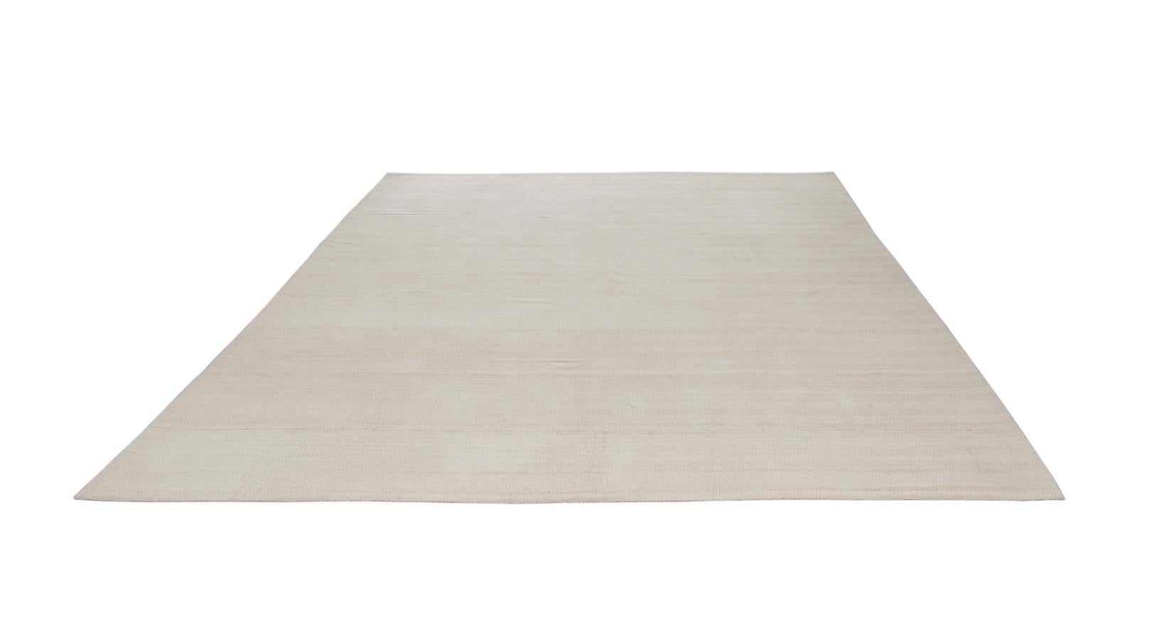 beige herringbone rug