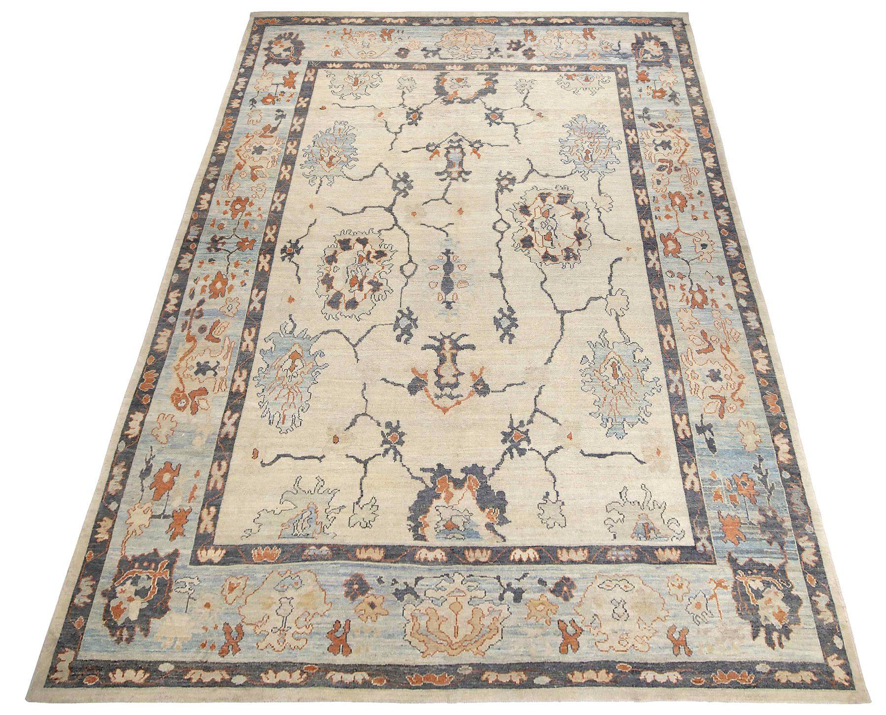 Descubre la elegancia de las alfombras persas Oushak de Circa 1990. Diseñado con Lana y AzulGrisMarfil, este diseño exclusivo es perfecto para realzar tu espacio.