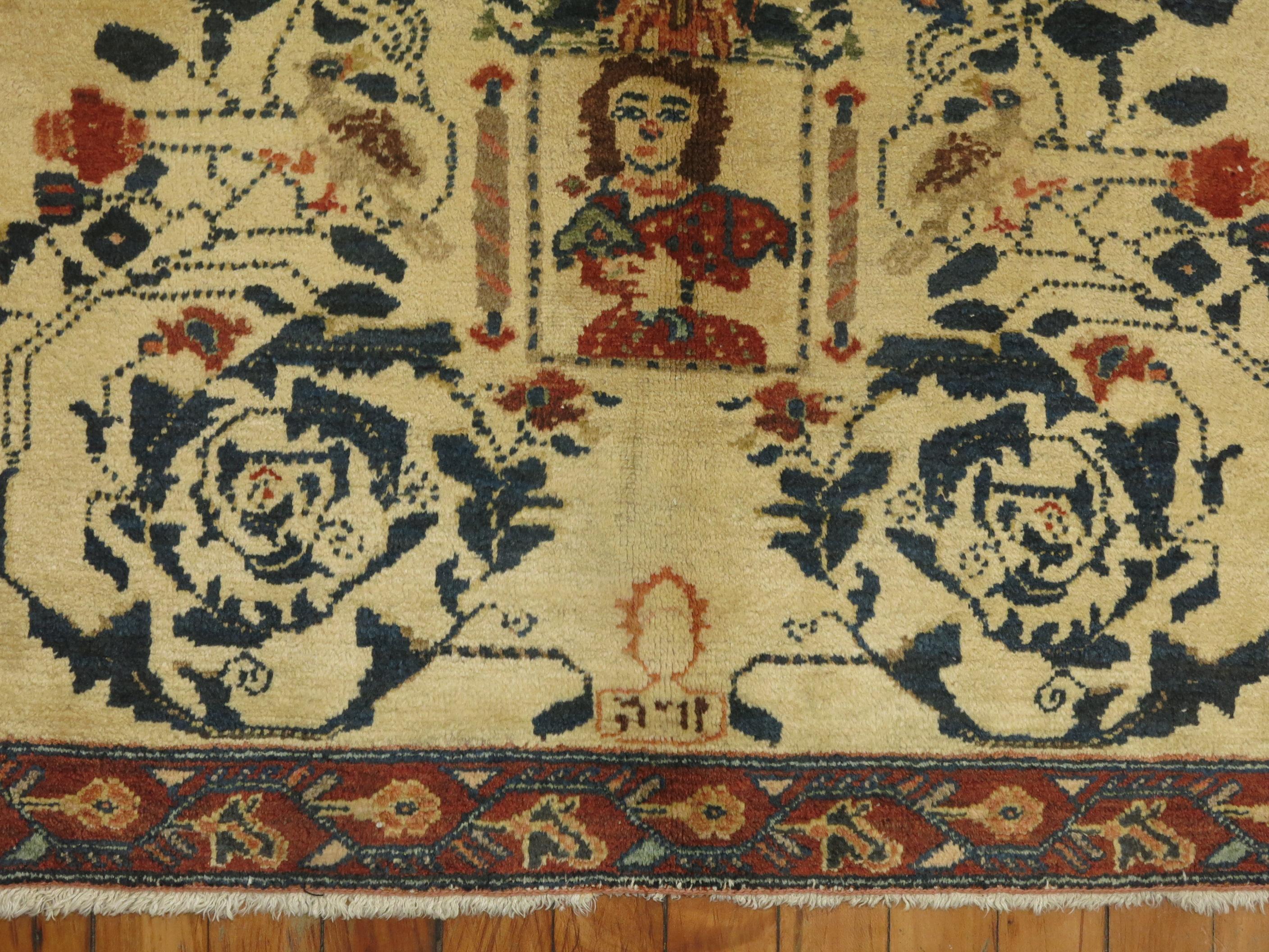 An authentic 20th century Persian Pictorial rug with what looks like a hebrew inscription.