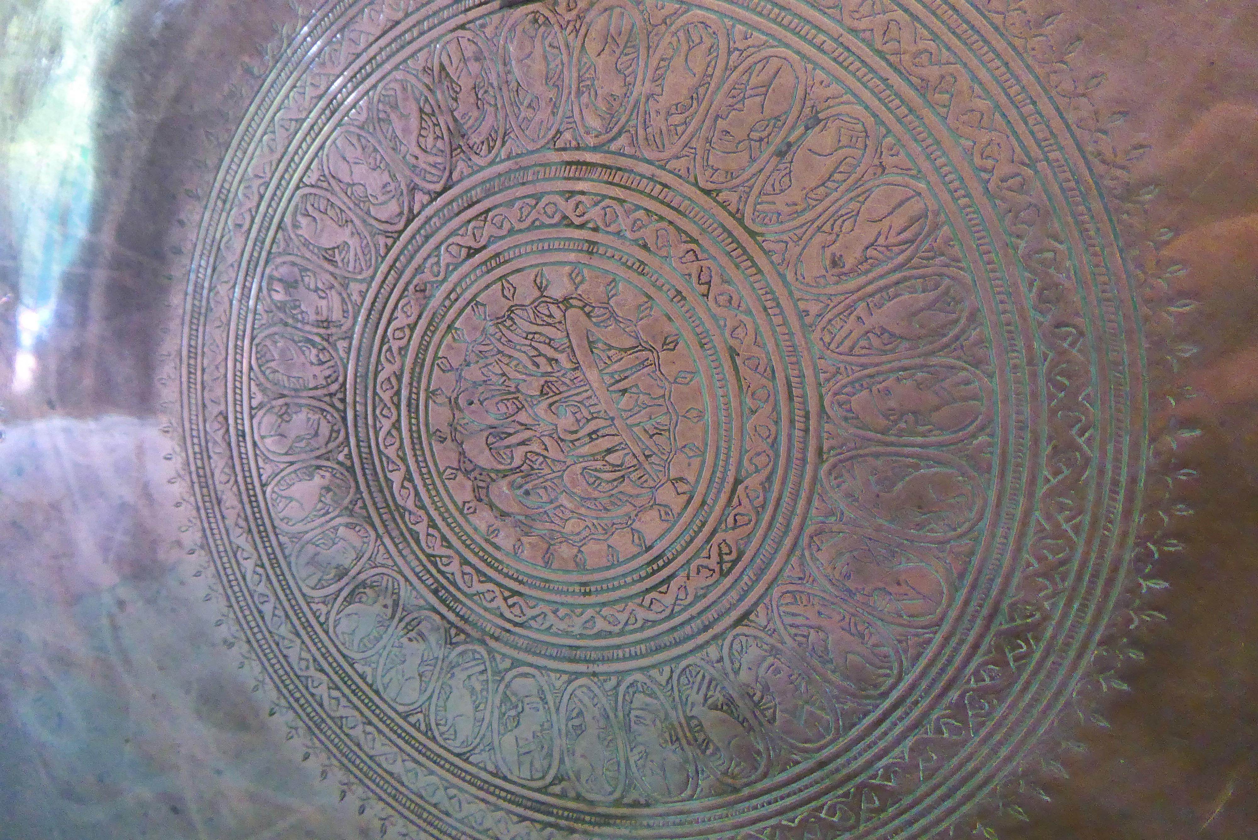 Large heavy thick hand hammered copper serving tray

With 28inch/71cms diameter,

circa 1900.
