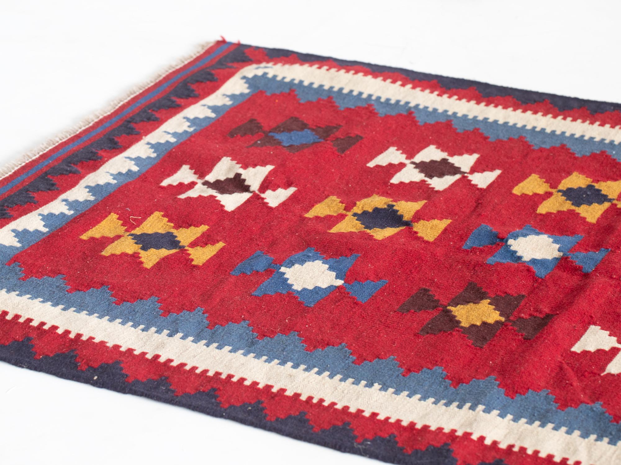 A hand-knotted Persian Qashqai kilim rug, mid-late 20C.

Stock ref. #2215

186 x 120 cm

6'1 x 3'11
