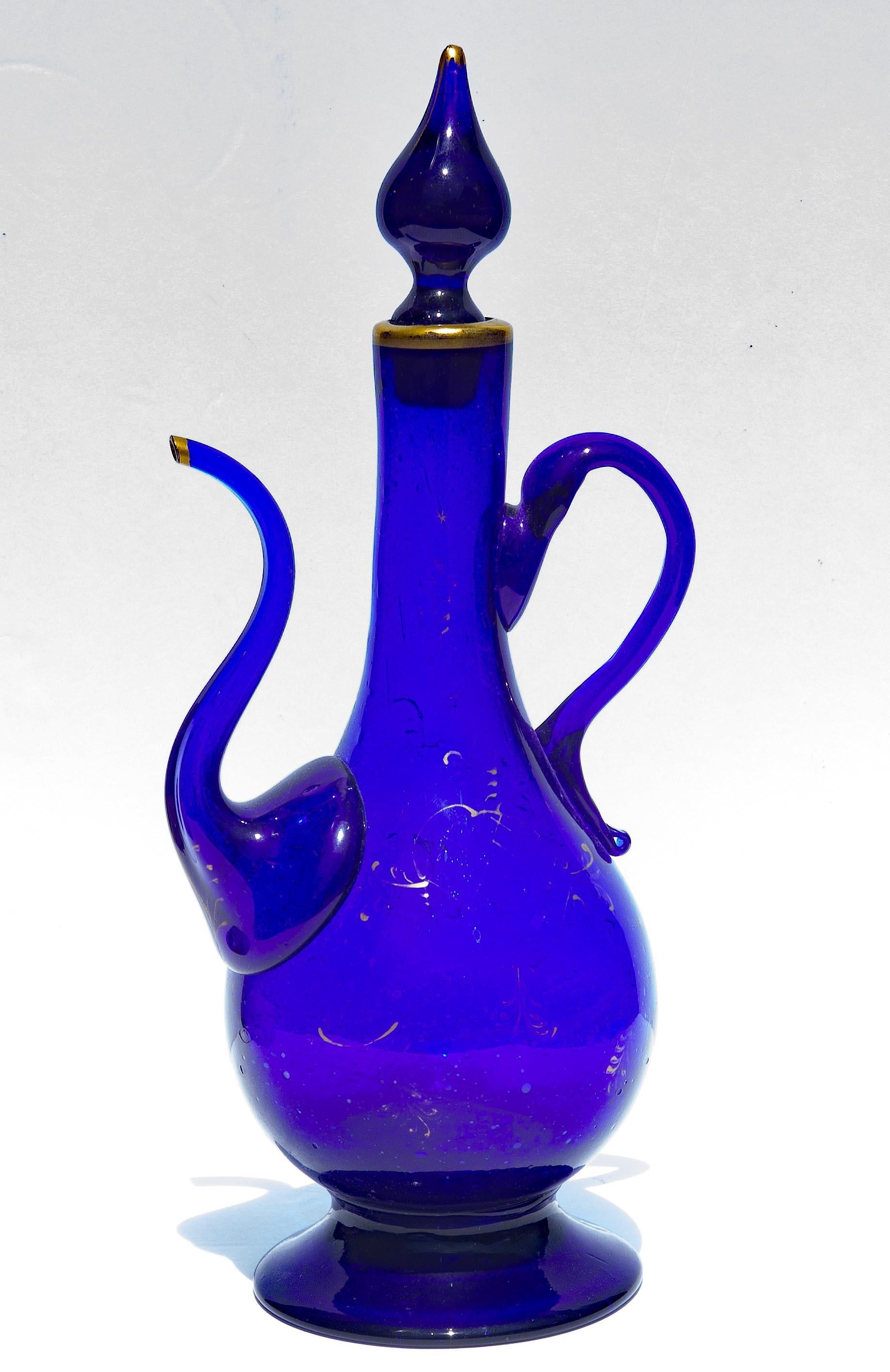  Persian hand blown royal blue glass ewer. Remnants of gold gilding. 19th century.