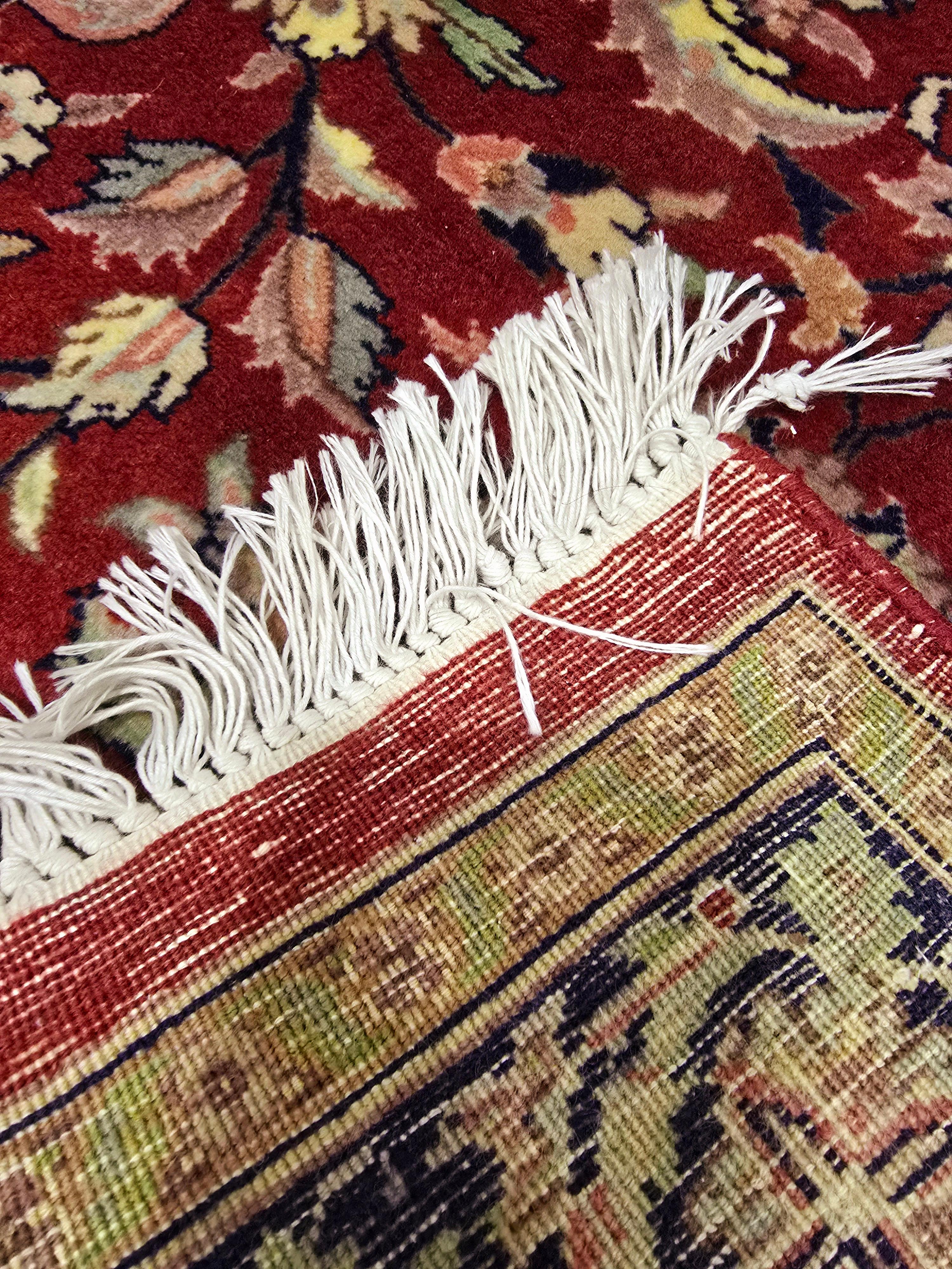 Persian rug from 1990s.

Handmade in perfect condition with flower patterns.

Great vintage find in mint condition with vibrant colours.