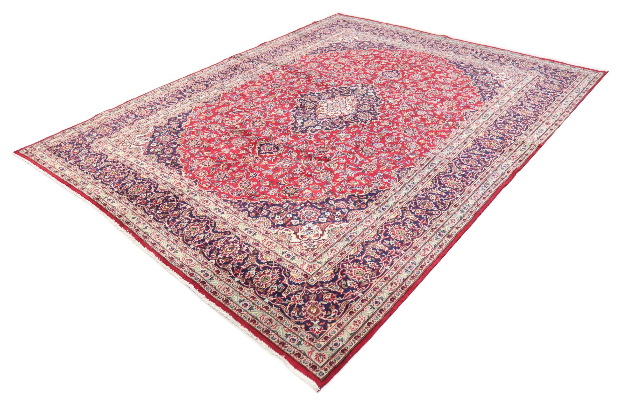 A stunning Persian rug, Keshan, 20th century. 

This rug originates from Keshan also called Kashan in Persia. It counts to the most popular Persian rugs. This Keshan comes in a typical design for its type. It has been crafted by hand from fine